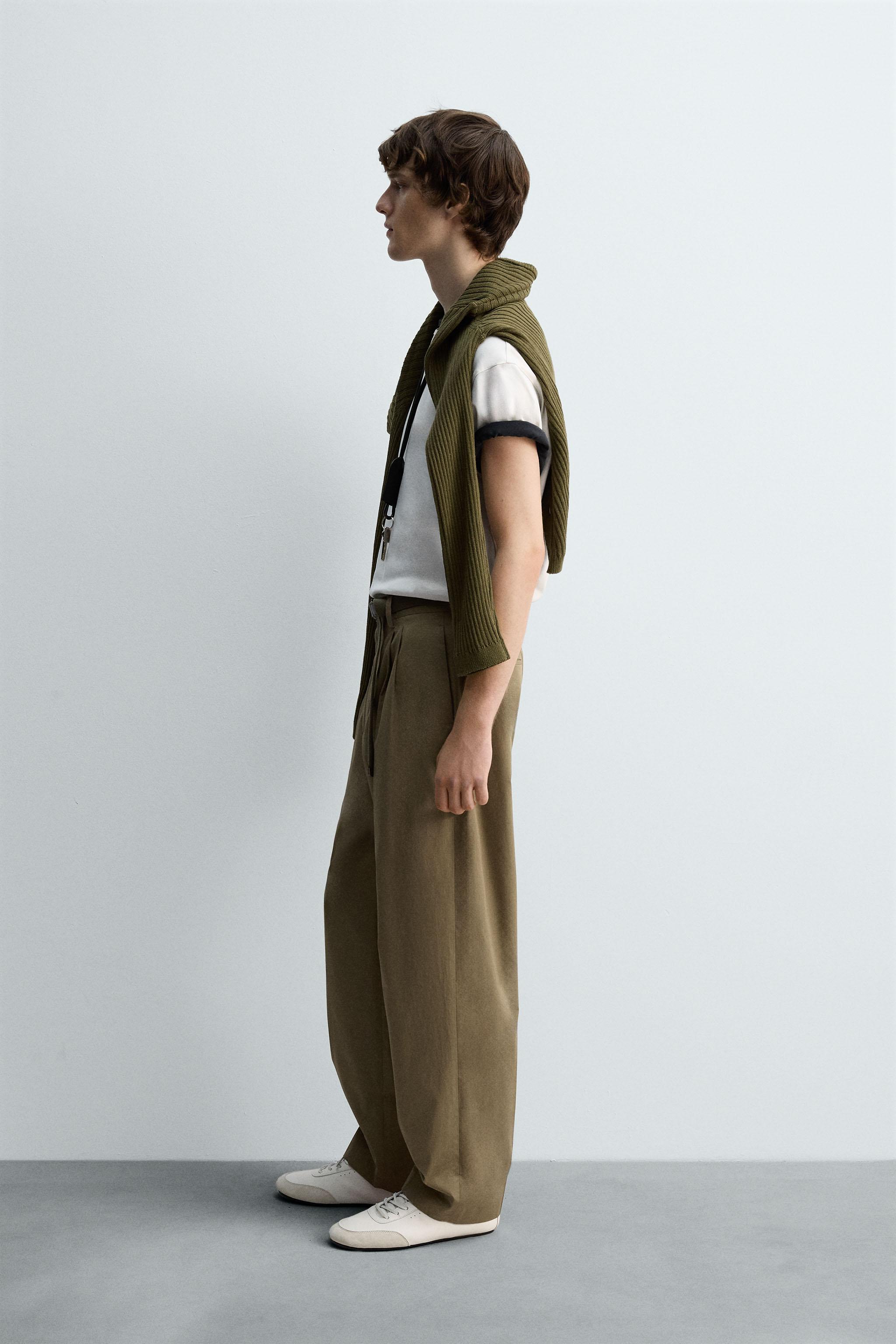 LIMITED EDITION RELAXED FIT PLEATED PANTS