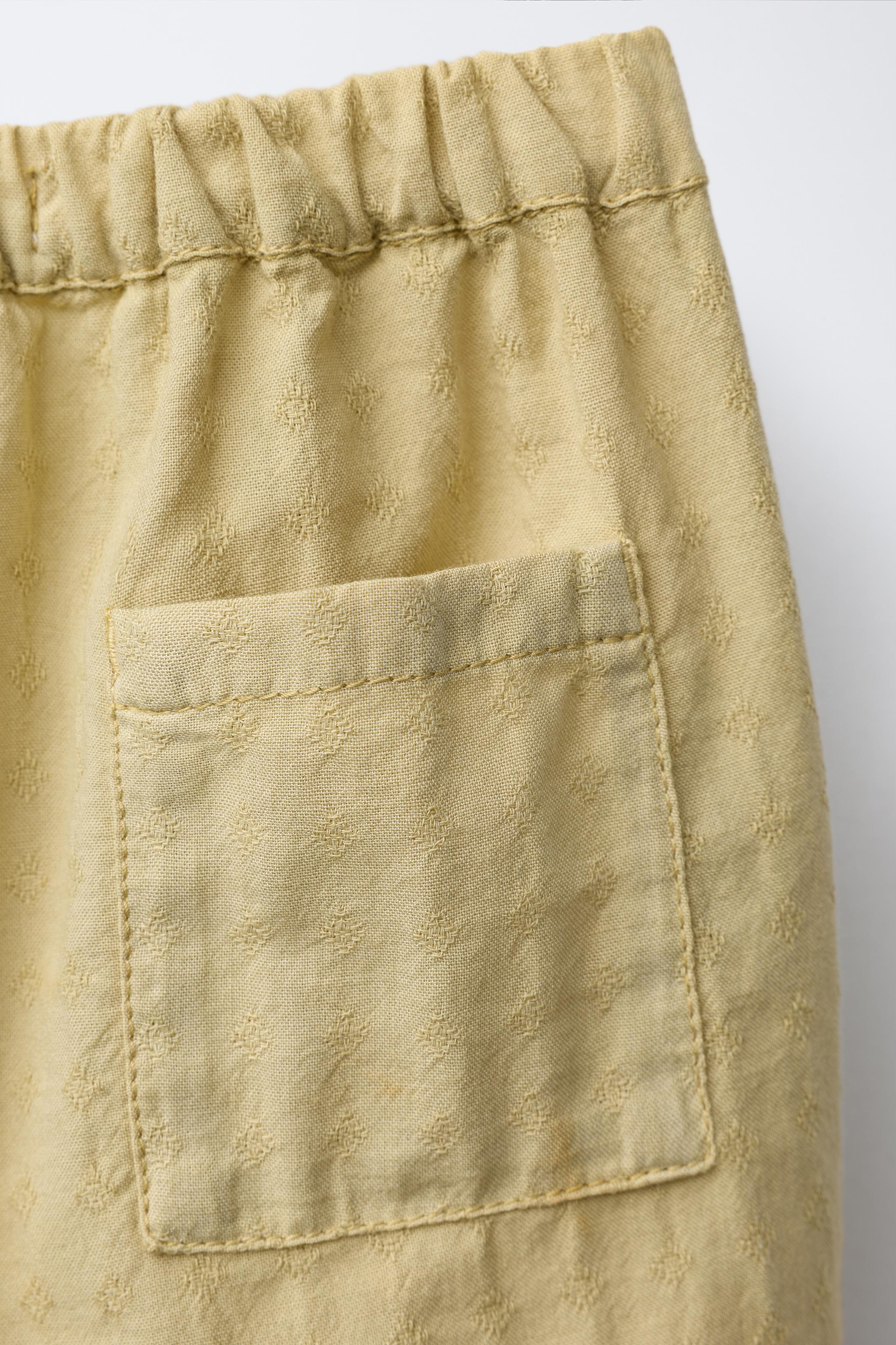 EMBROIDERED STRAIGHT LEG PANTS