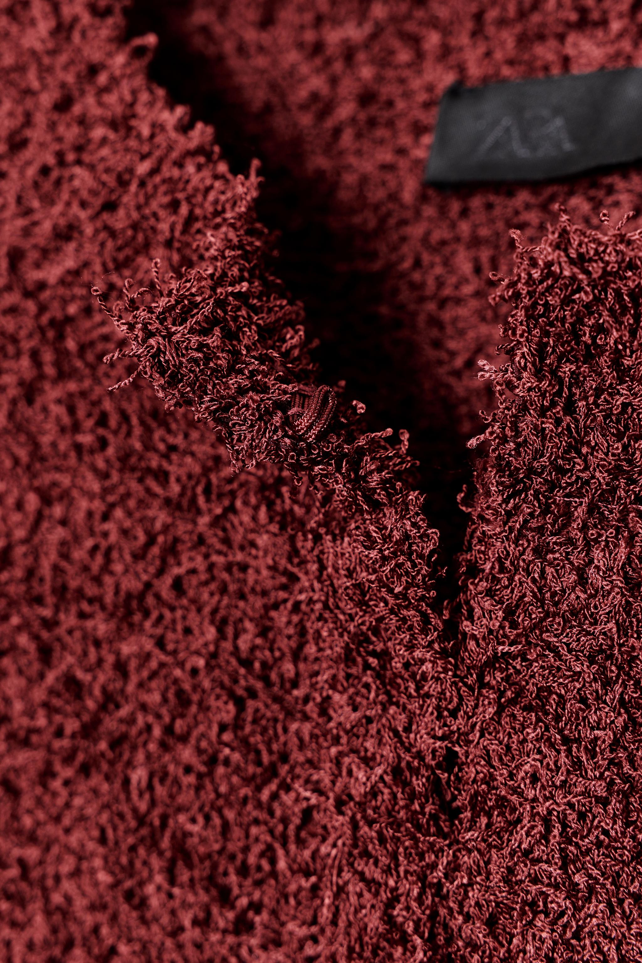 FRINGED KNIT CARDIGAN