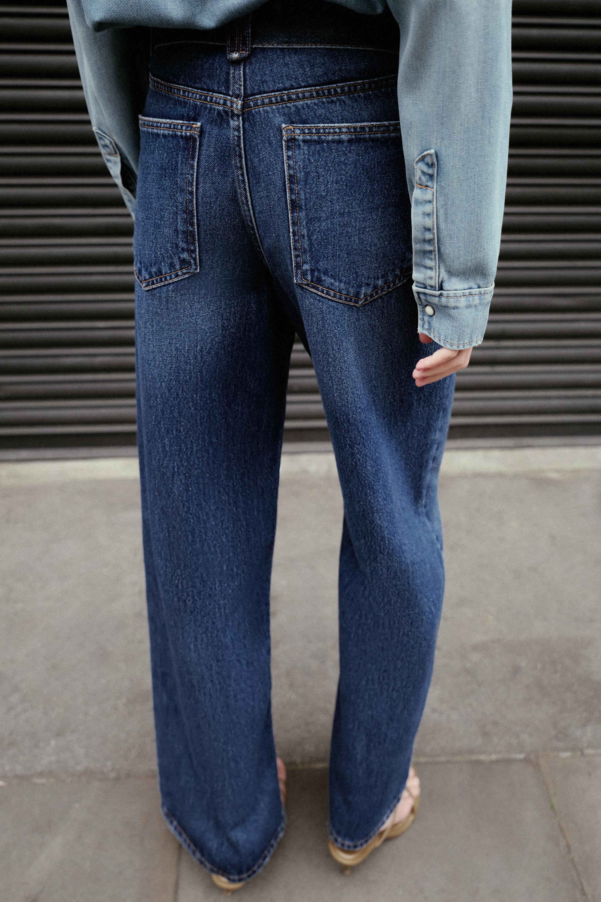 MID-RISE BELTED WIDE LEG JEANS