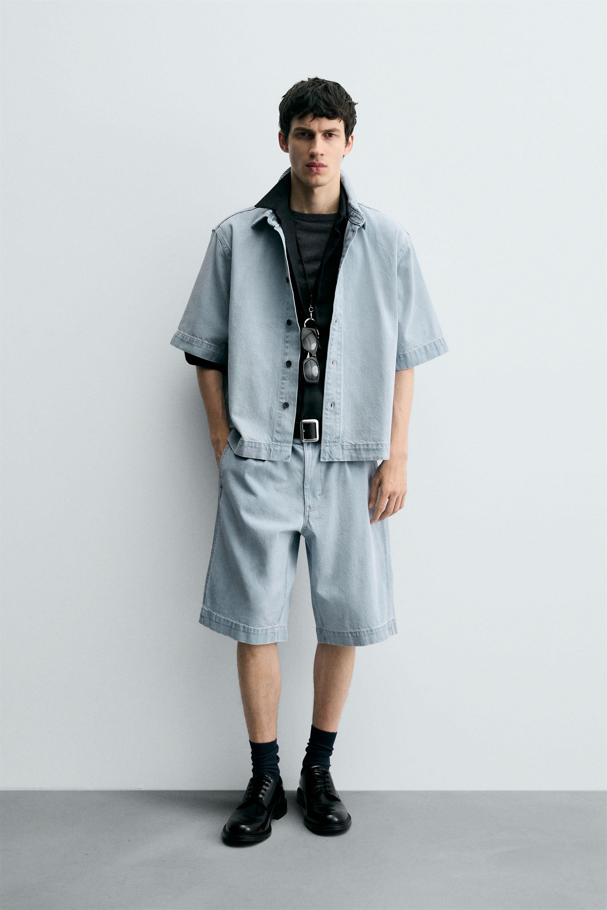 PLEATED RELAXED FIT DENIM SHORTS