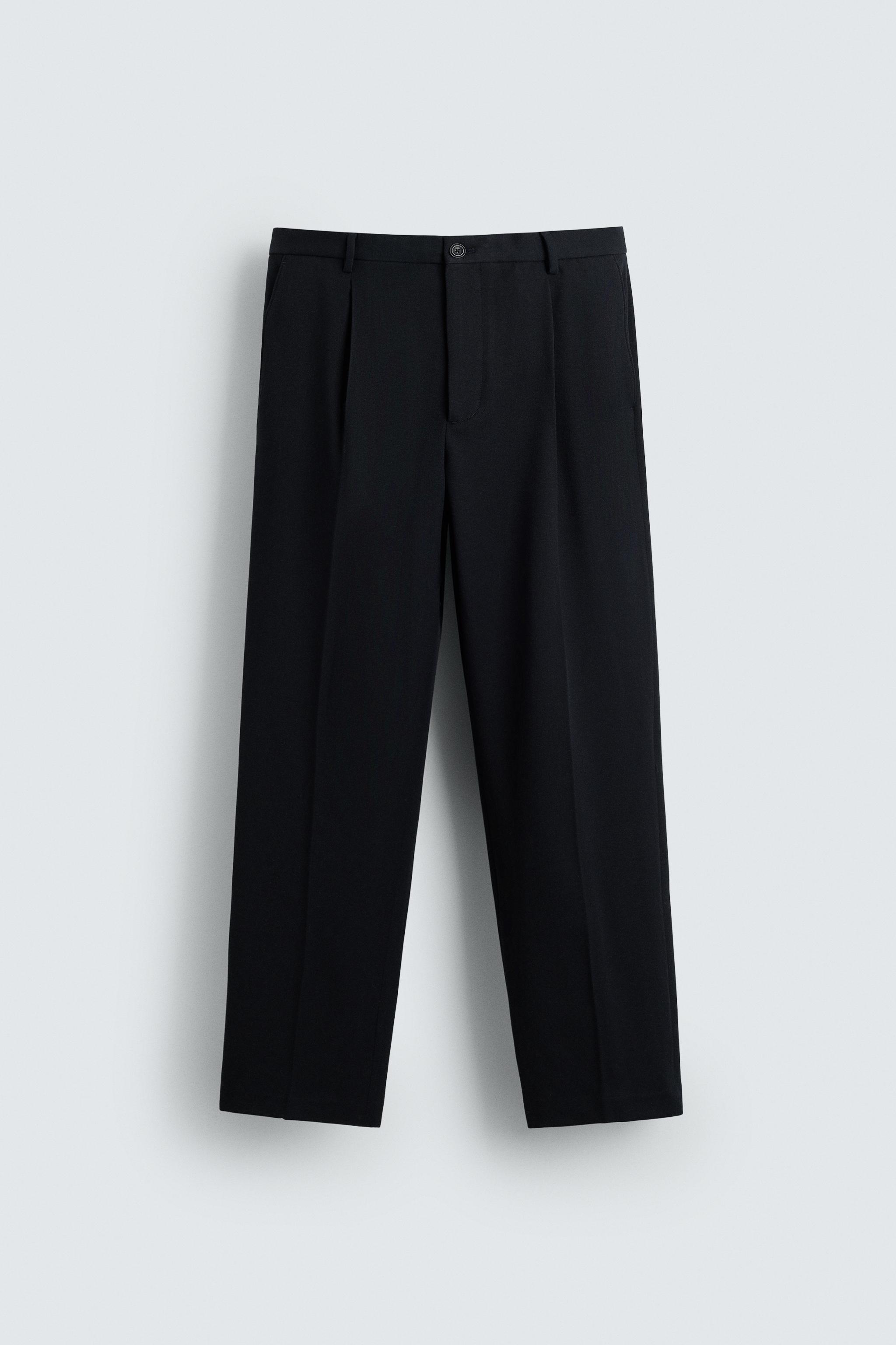 REGULAR FIT PLEATED PANTS