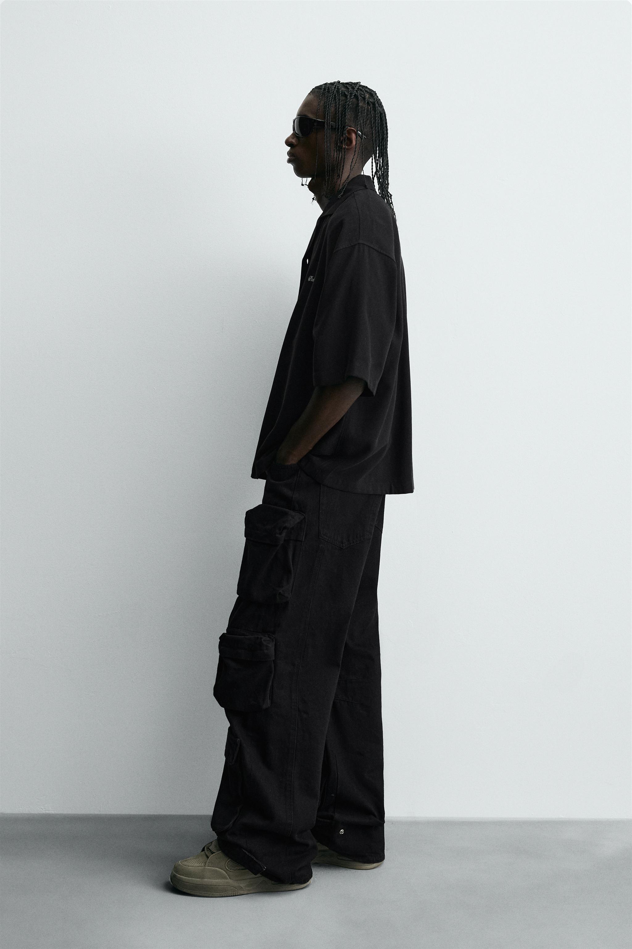 FLOWY SHIRT WITH EMBROIDERED TEXT