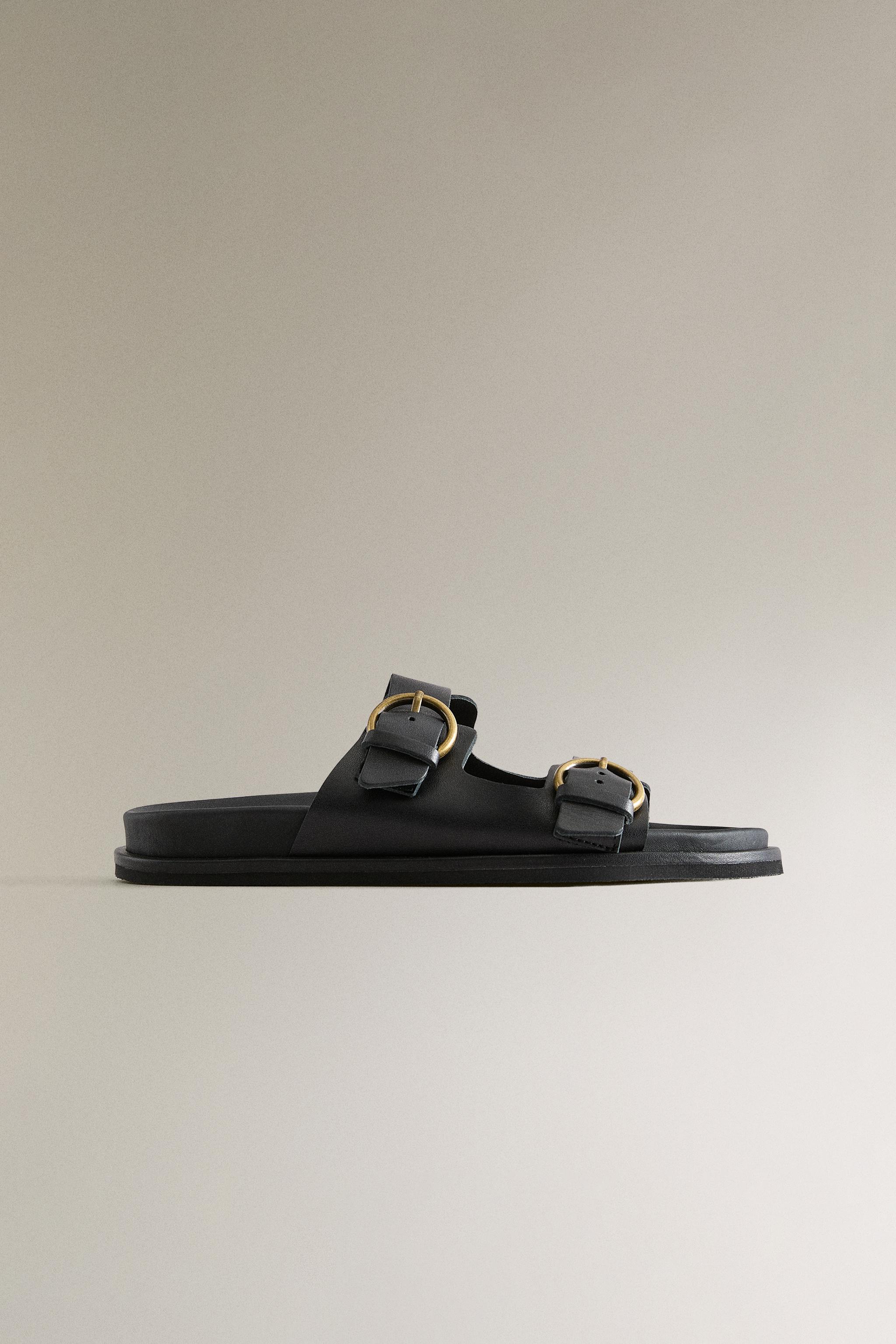 FLAT LEATHER SANDALS WITH BUCKLES