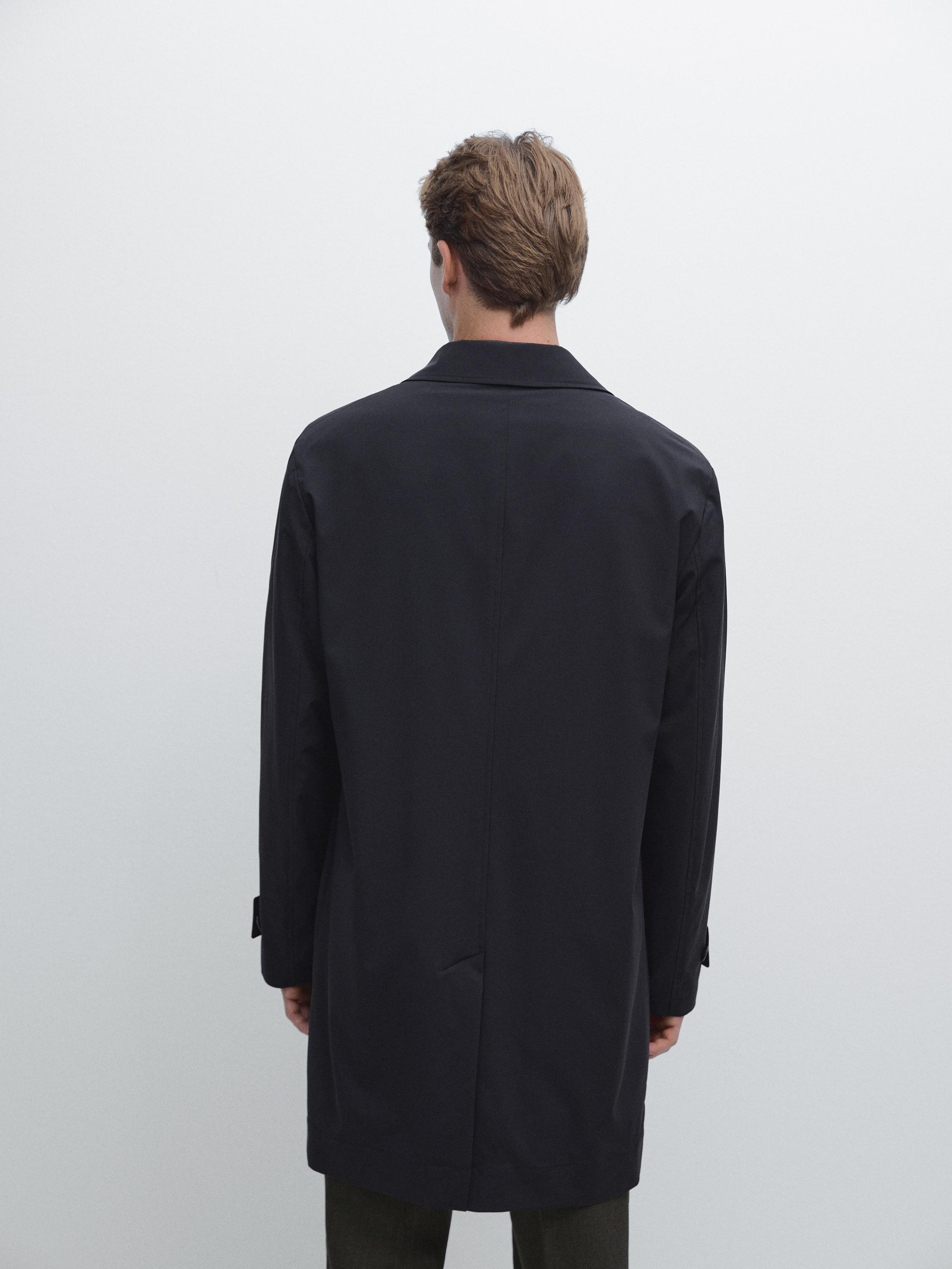 Lightweight trench coat with hidden buttons