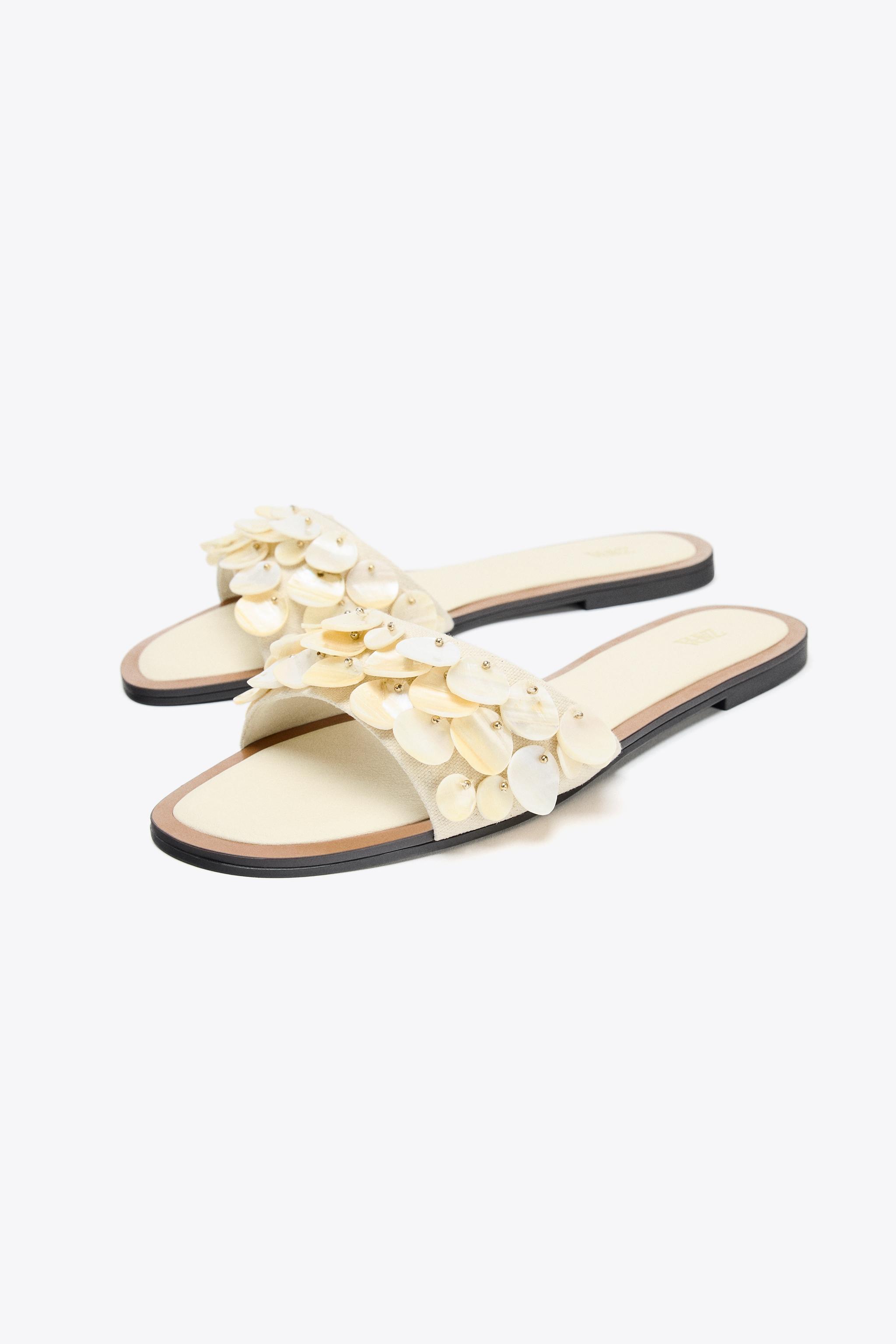 FLAT SANDALS WITH PEARLESCENT PIECES