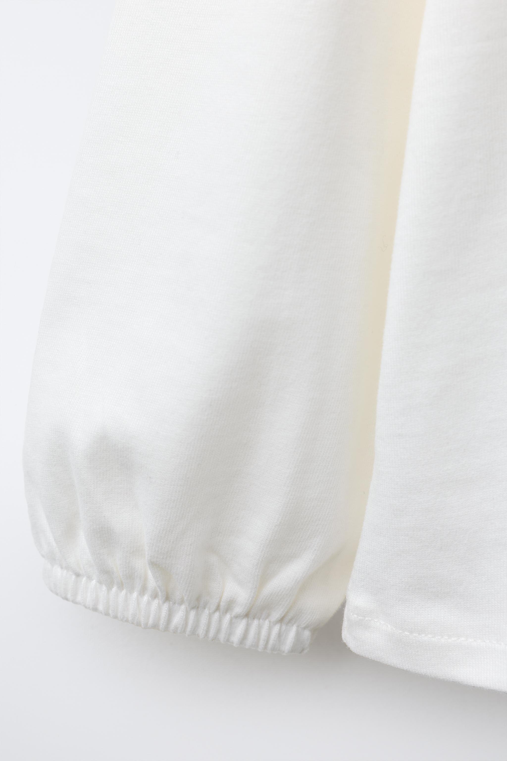 EMBROIDERED COLLAR TOP