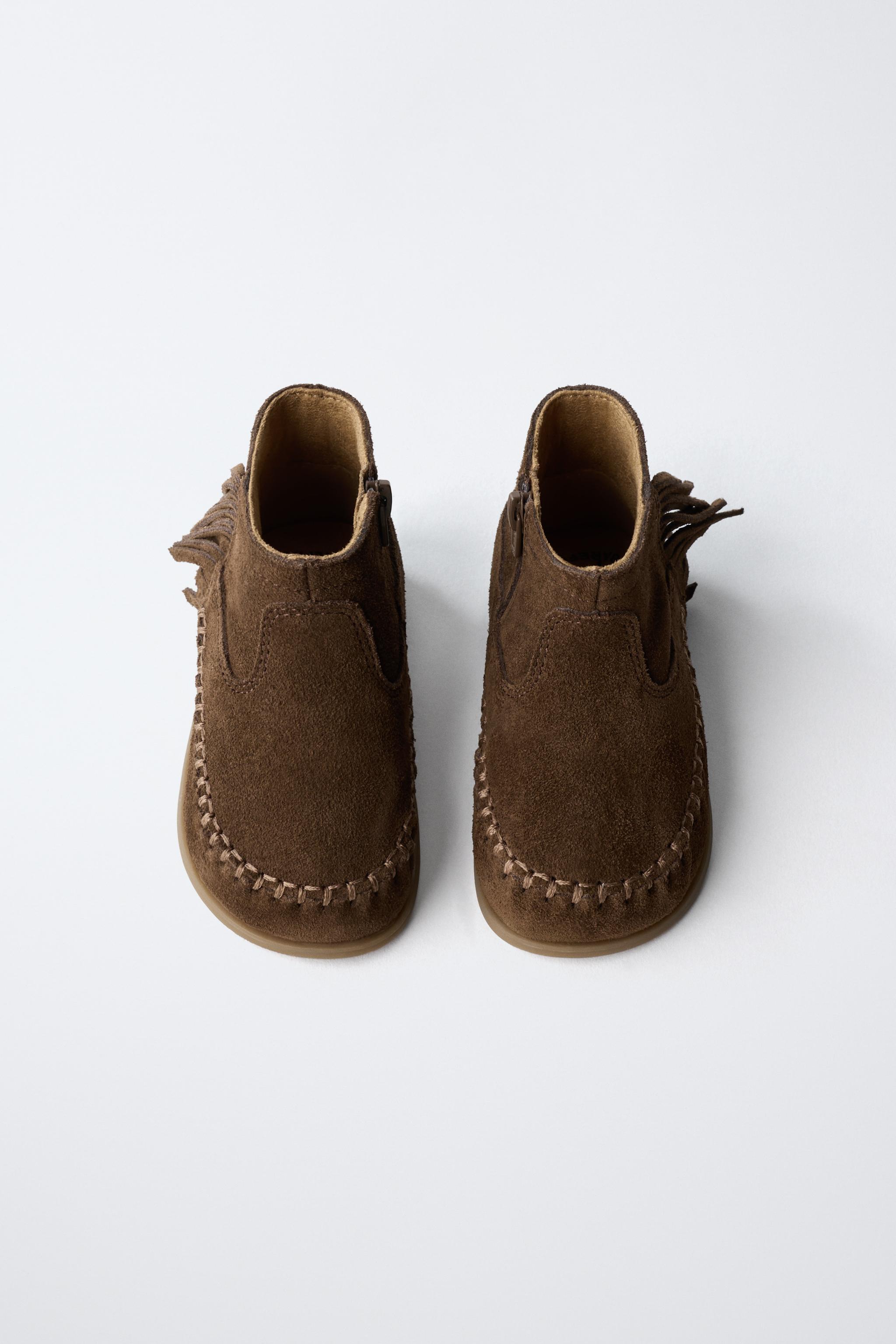 FRINGED LEATHER BOOTS