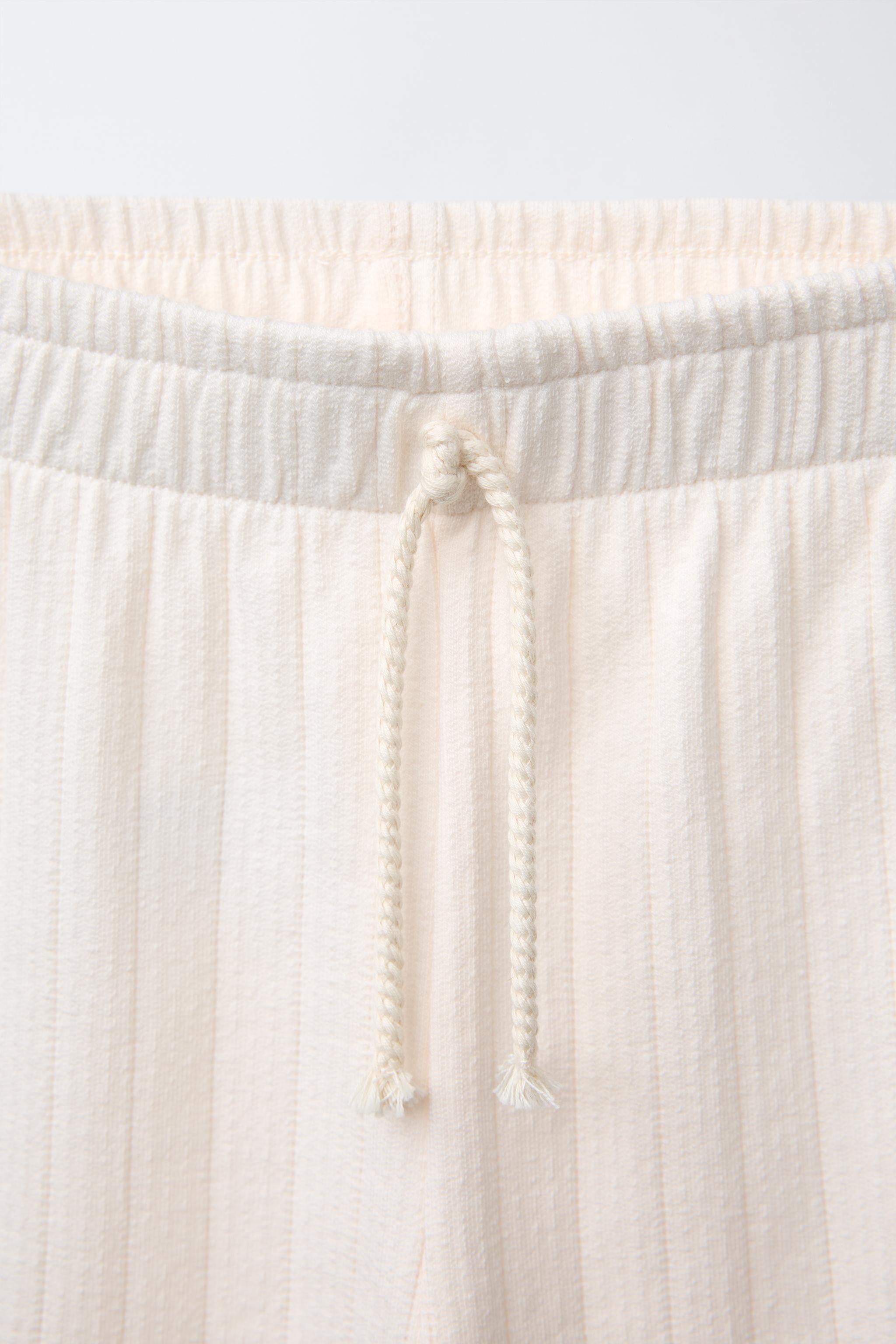 SWISS EMBROIDERED JACQUARD PANTS