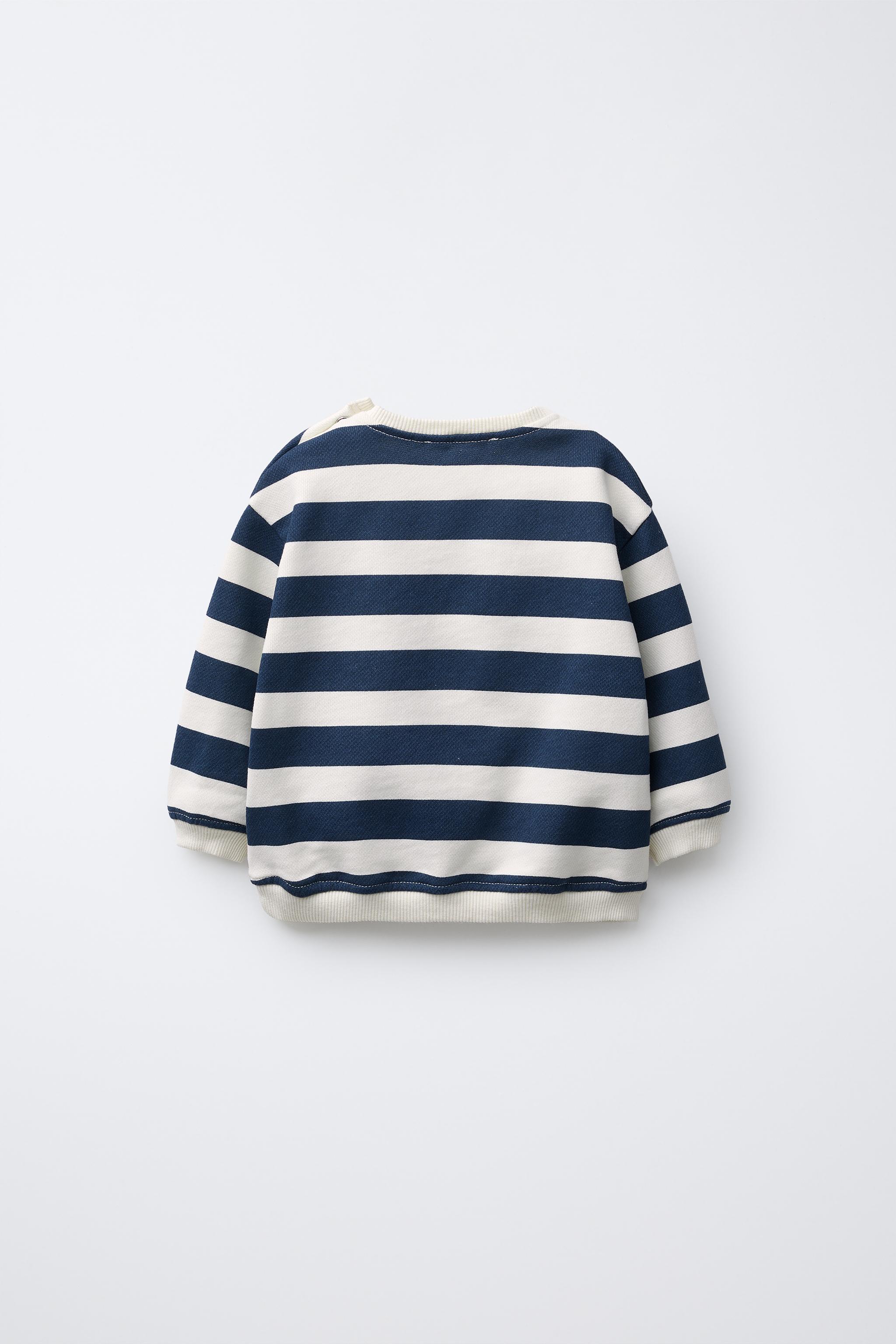 STRIPED SWEATSHIRT WITH LION PATCH