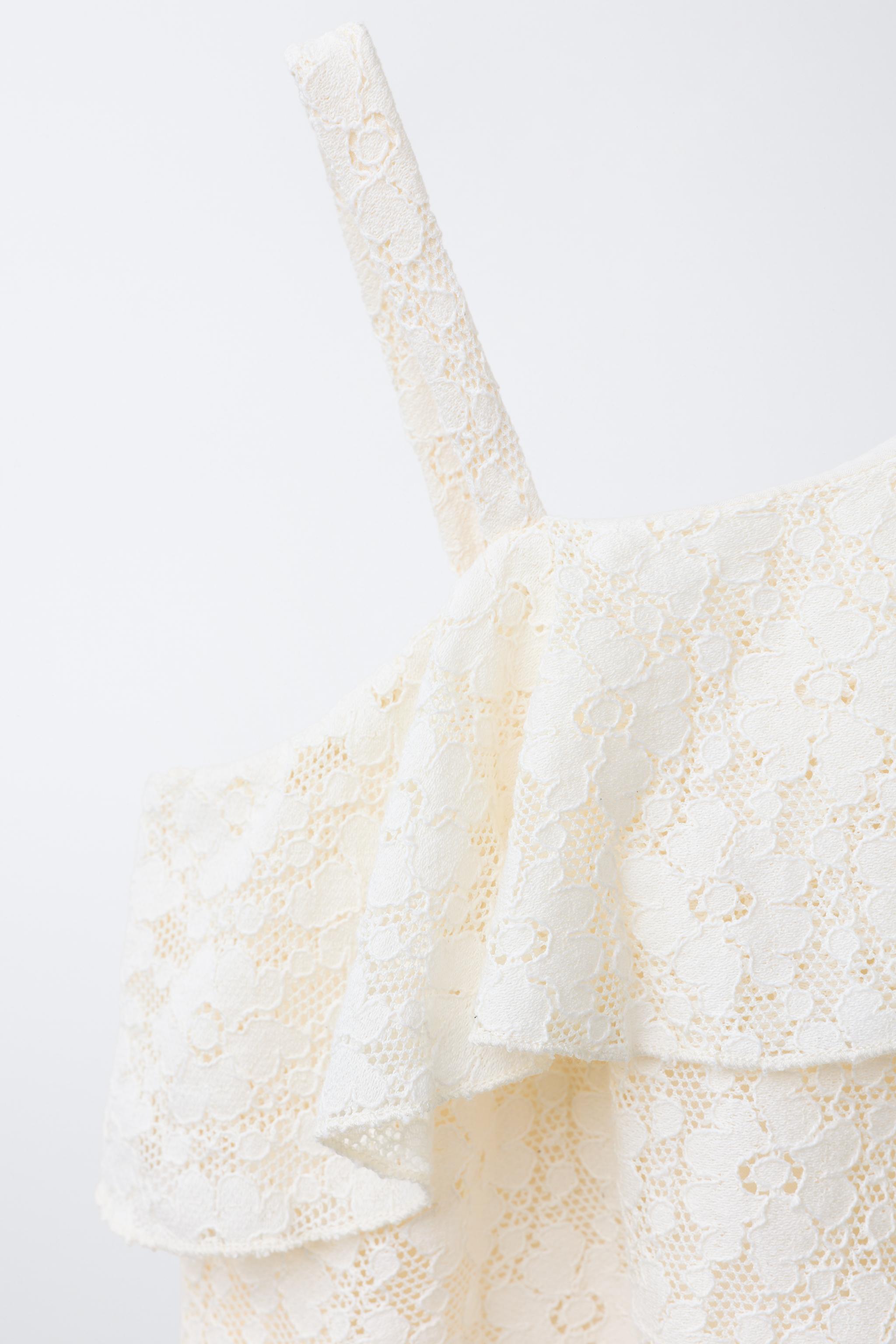 ASYMMETRIC RUFFLED LACE TOP