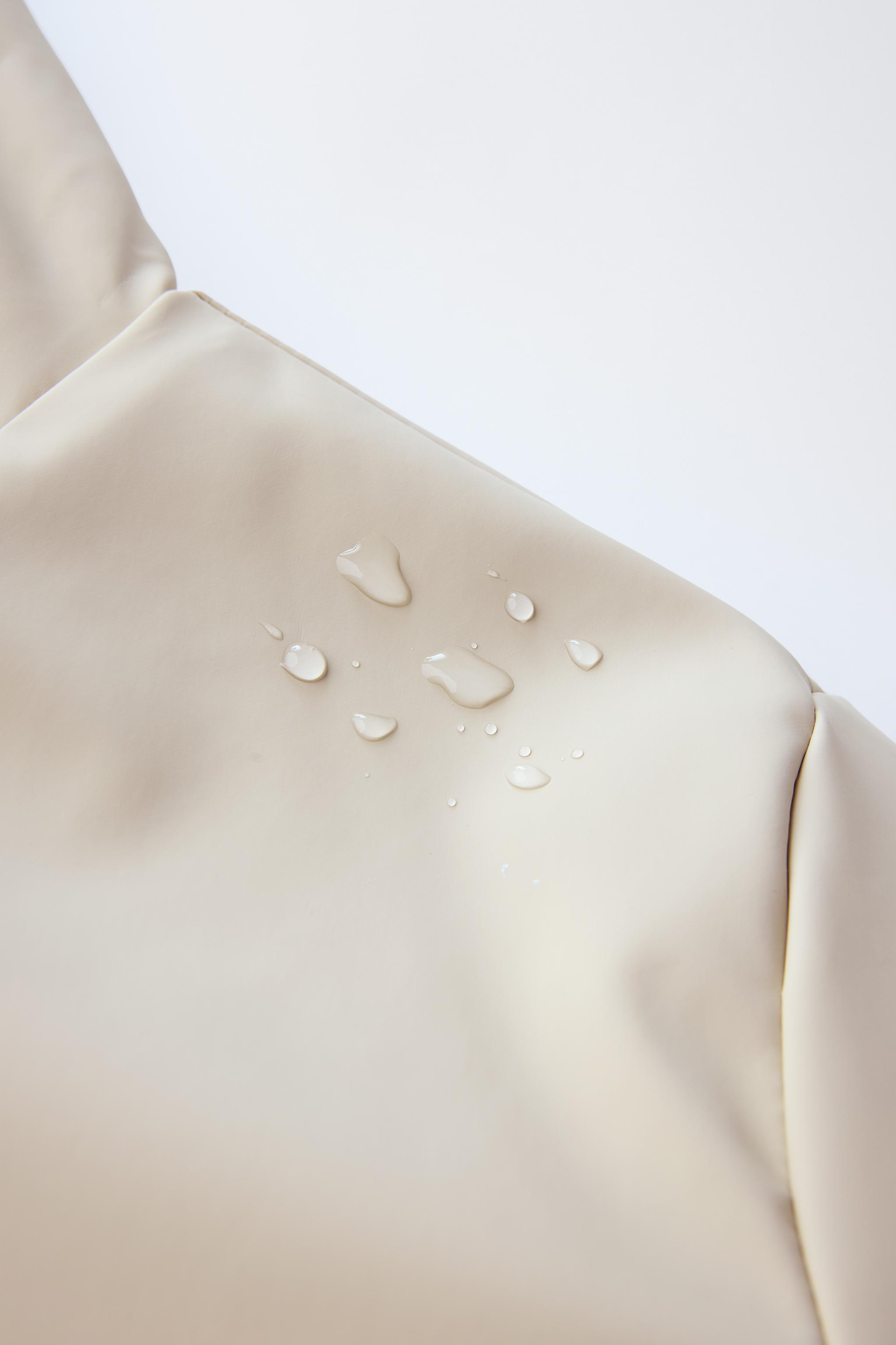 WATER REPELLENT FAUX FUR LINED RUBBERIZED JACKET