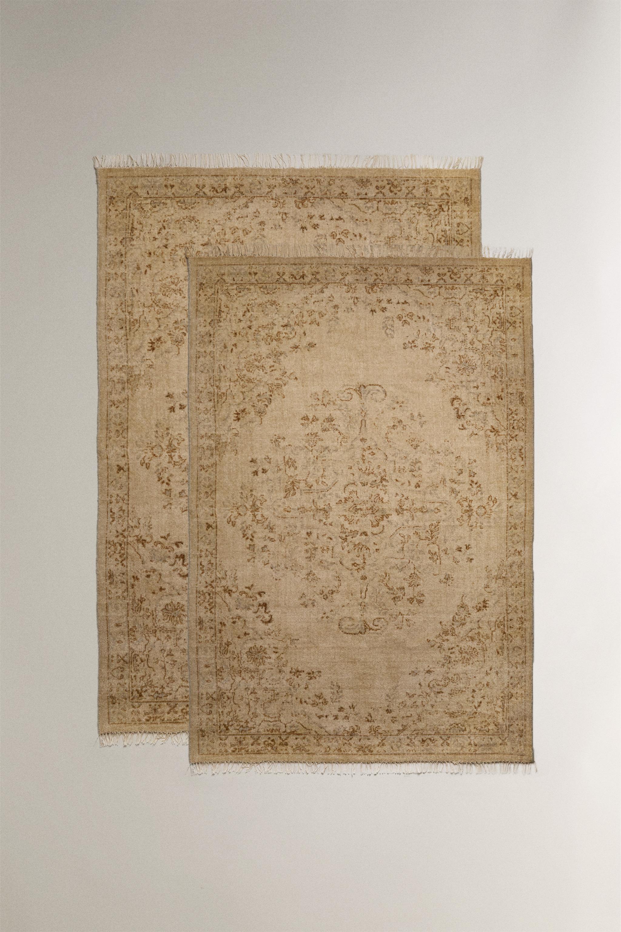 WOOL AREA RUG WITH A FLORAL PRINT