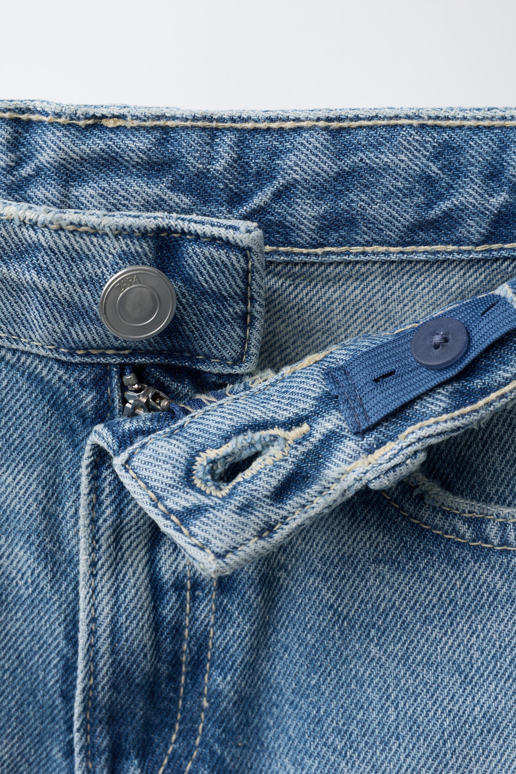 DISTRESSED WIDE LEG JEANS