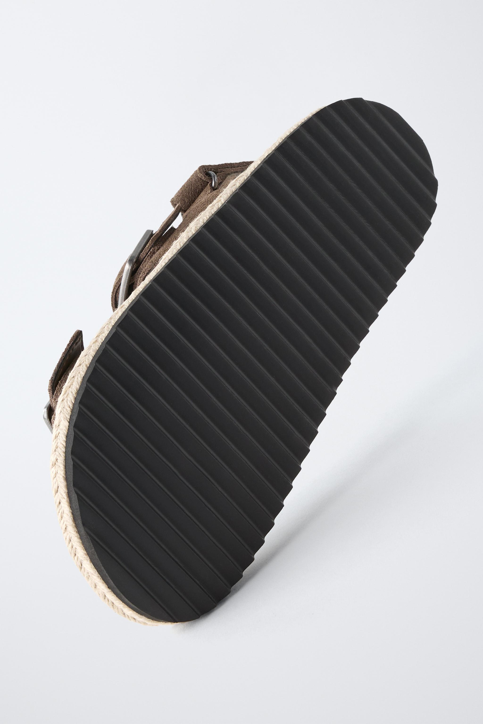 LEATHER AND JUTE BUCKLE SANDALS