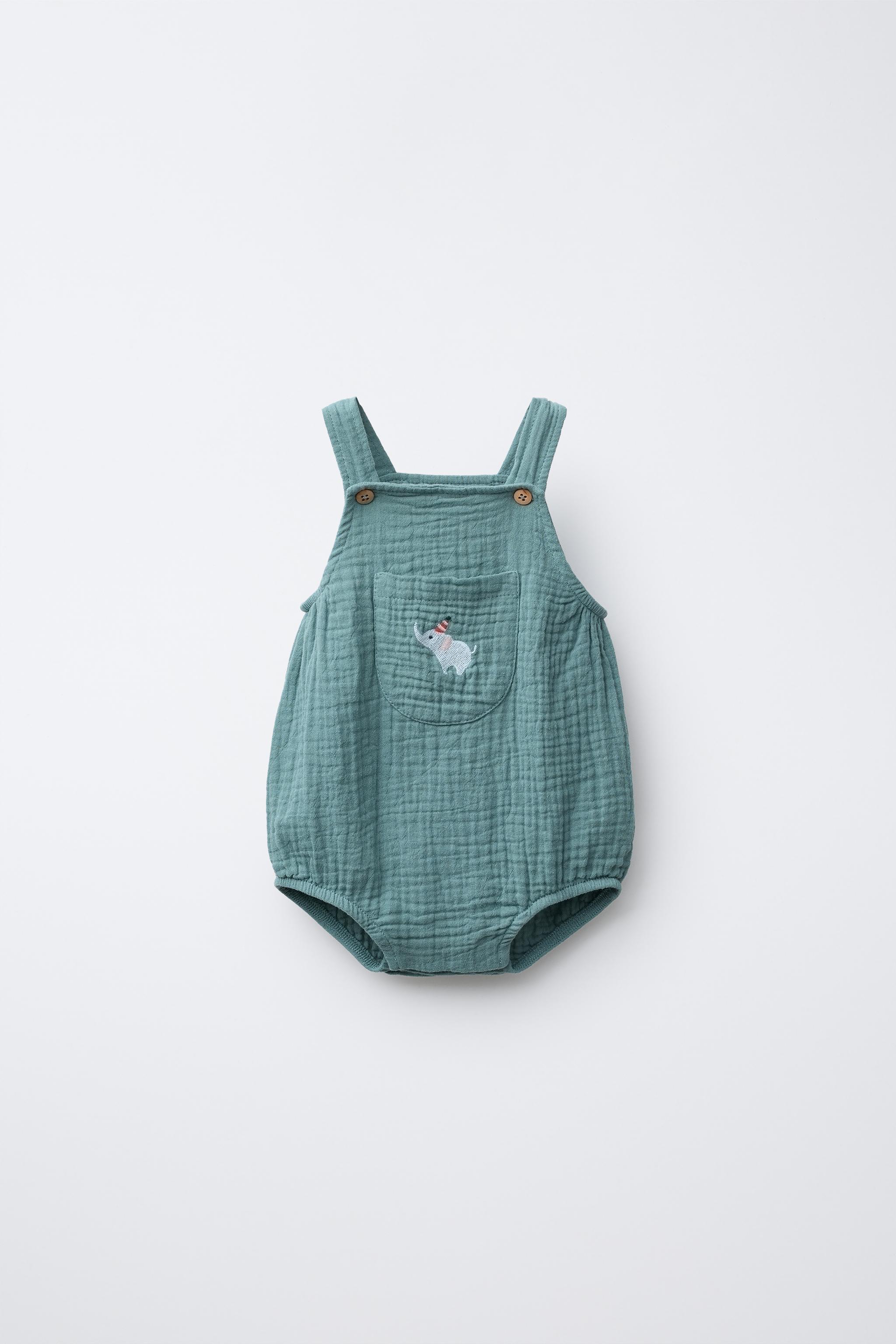 TEXTURED JUMPSUIT WITH ELEPHANT EMBROIDERY