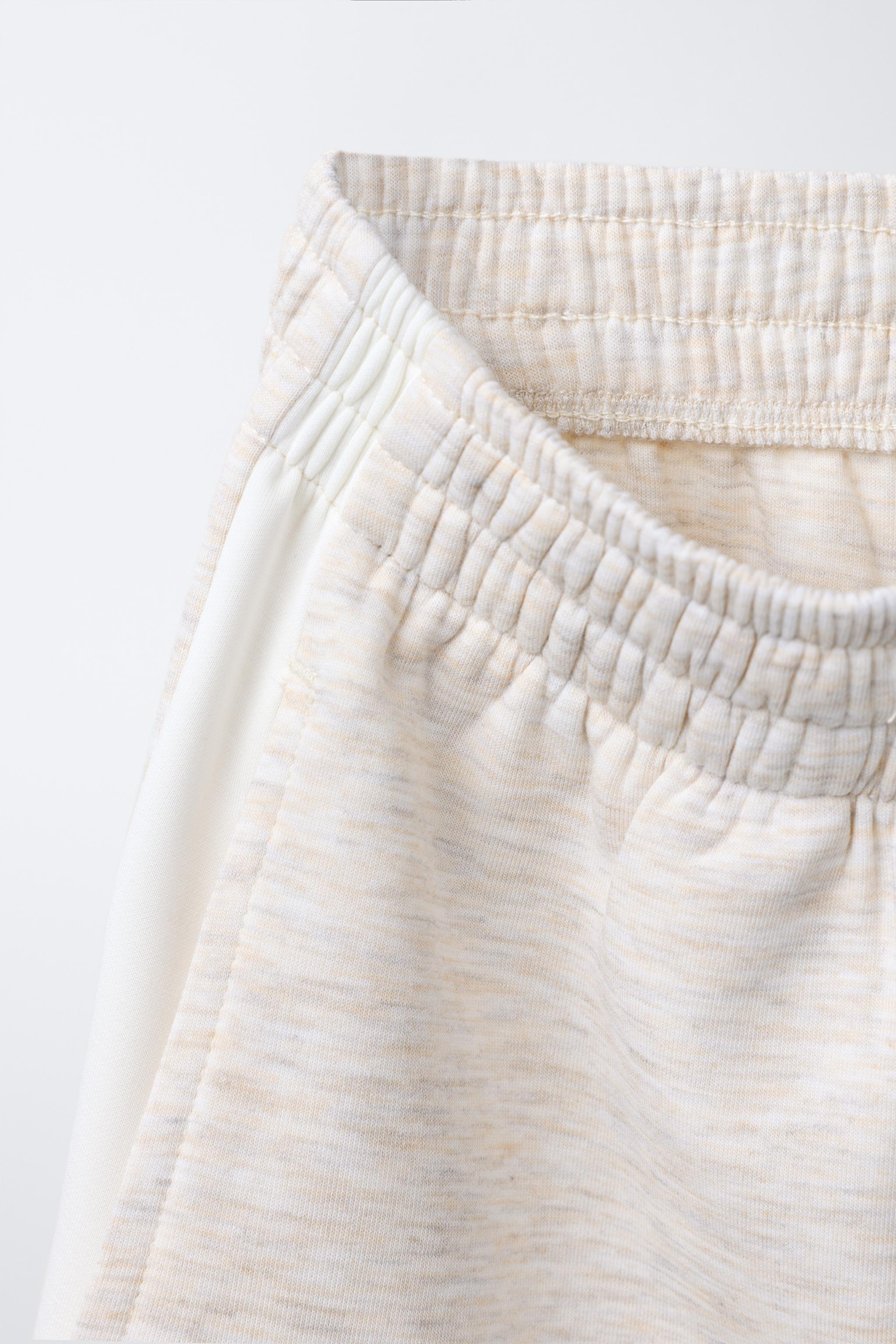 WIDE LEG PANTS WITH SIDE STRIPES