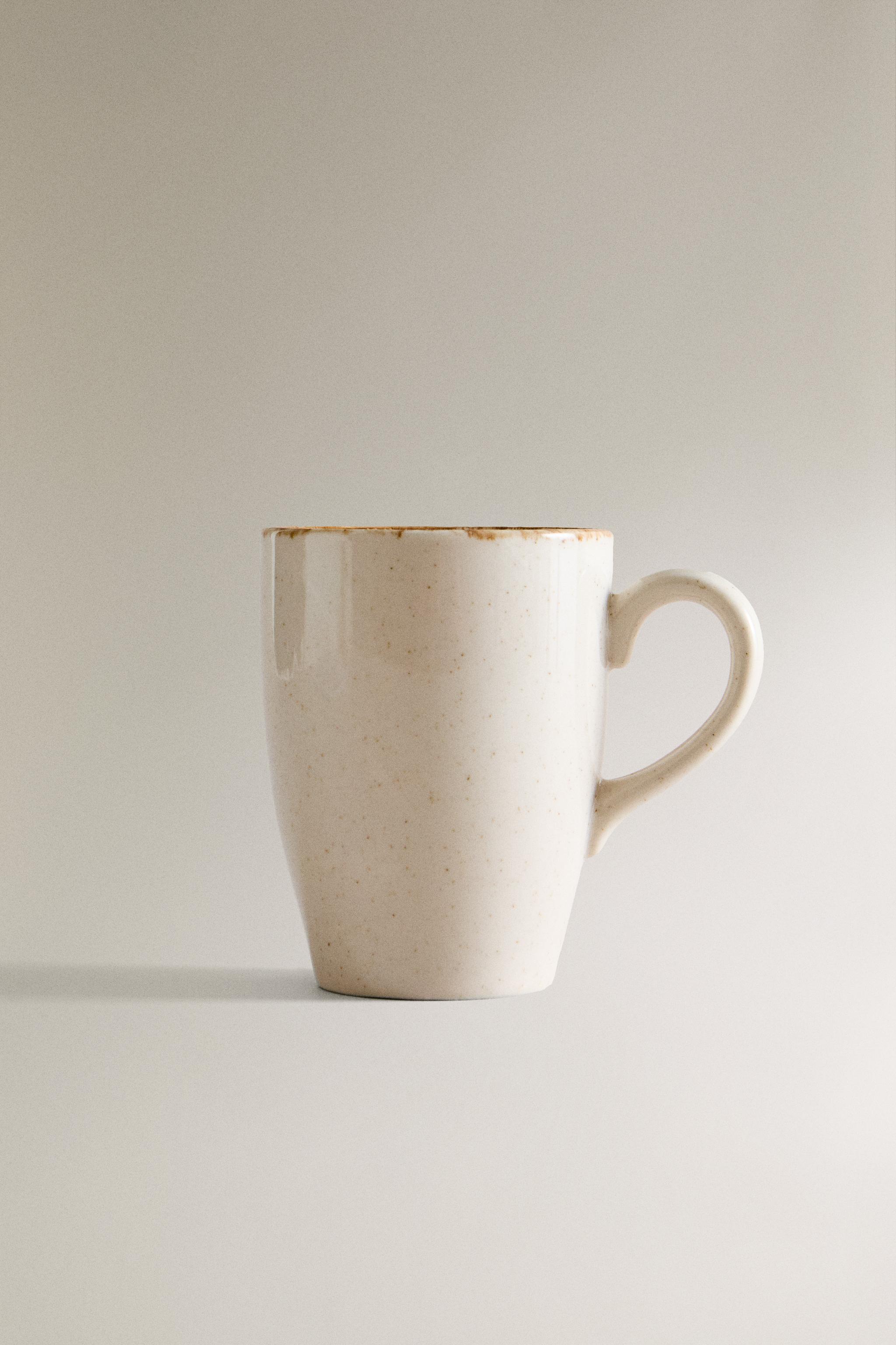 PORCELAIN MUG WITH ANTIQUE FINISH RIM