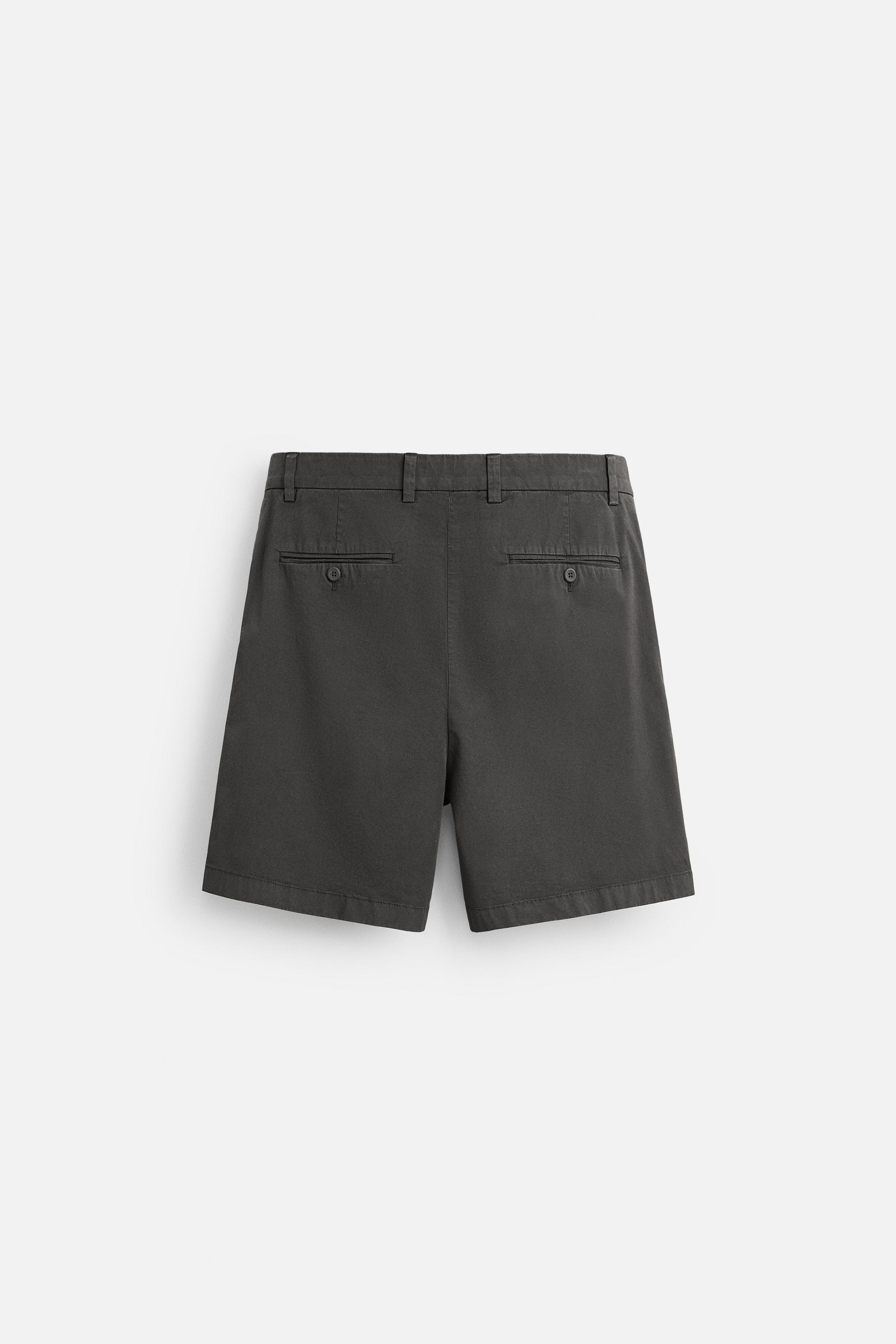REGULAR FIT PLEATED BERMUDA SHORTS
