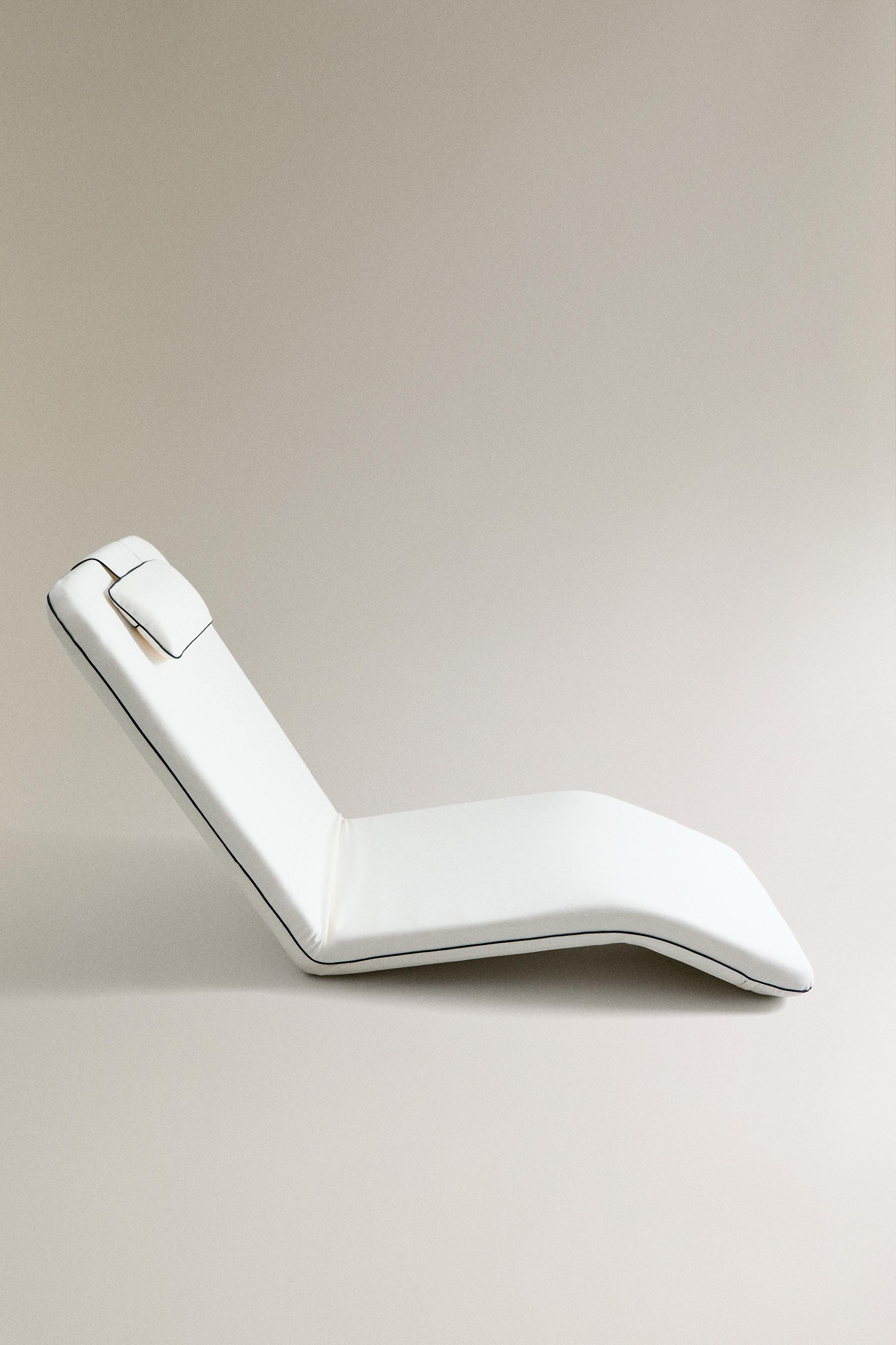 RECLINING FLOOR BEACH LOUNGER
