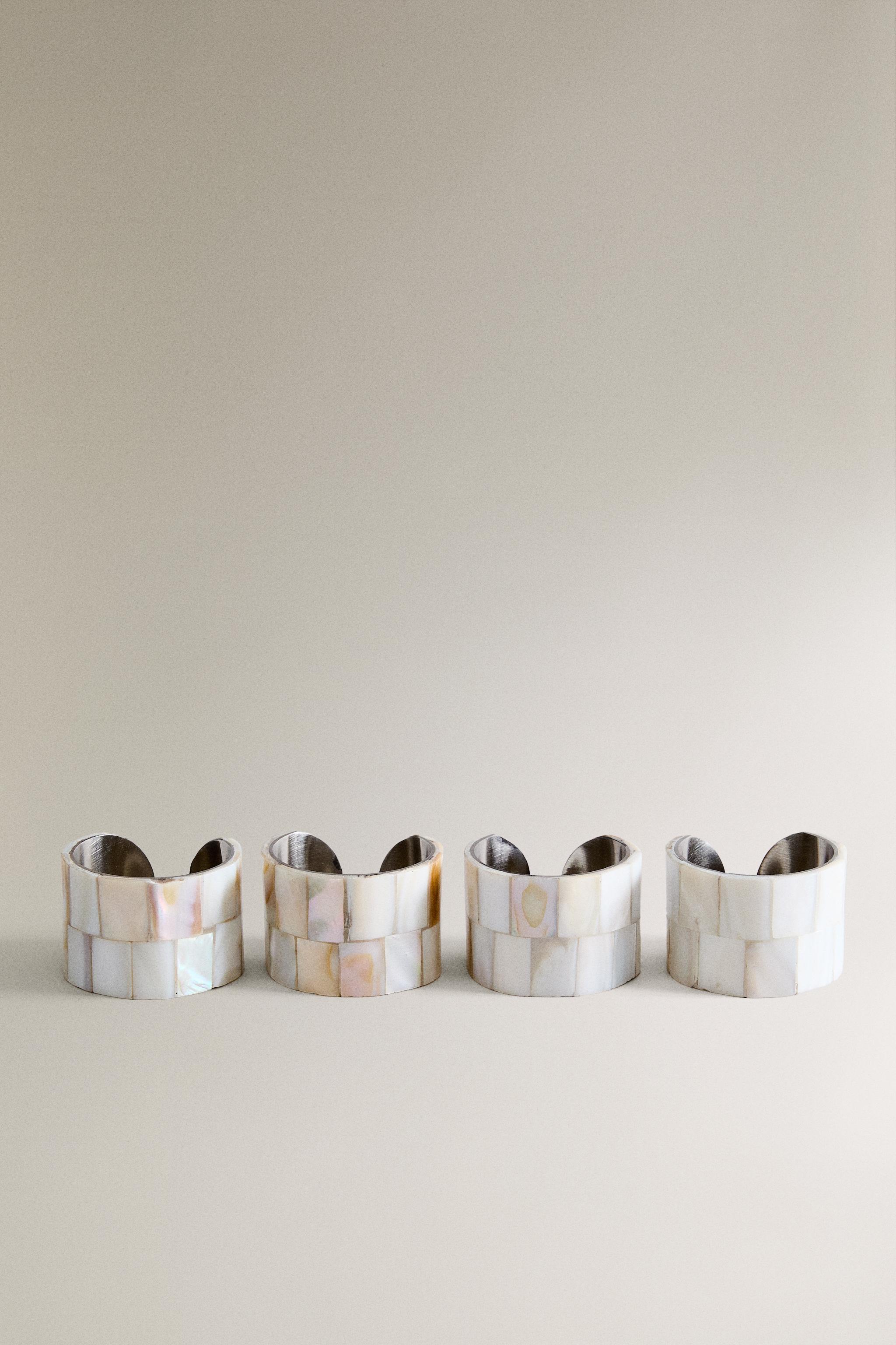 SET OF MOTHER-OF-PEARL NAPKIN RINGS (SET OF 4)