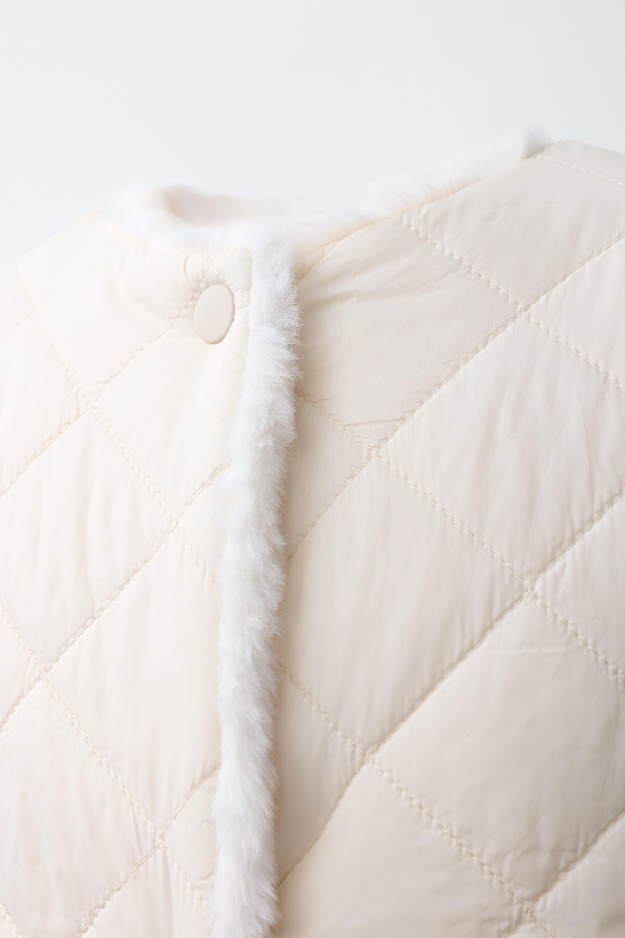 REVERSIBLE FAUX FUR VEST