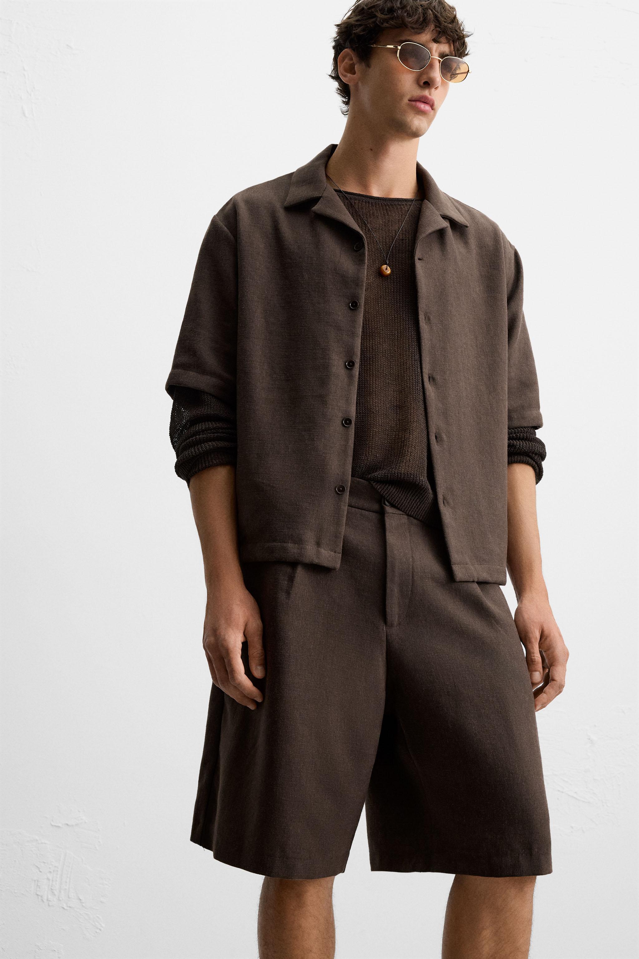 TEXTURED PLEATED SHORTS