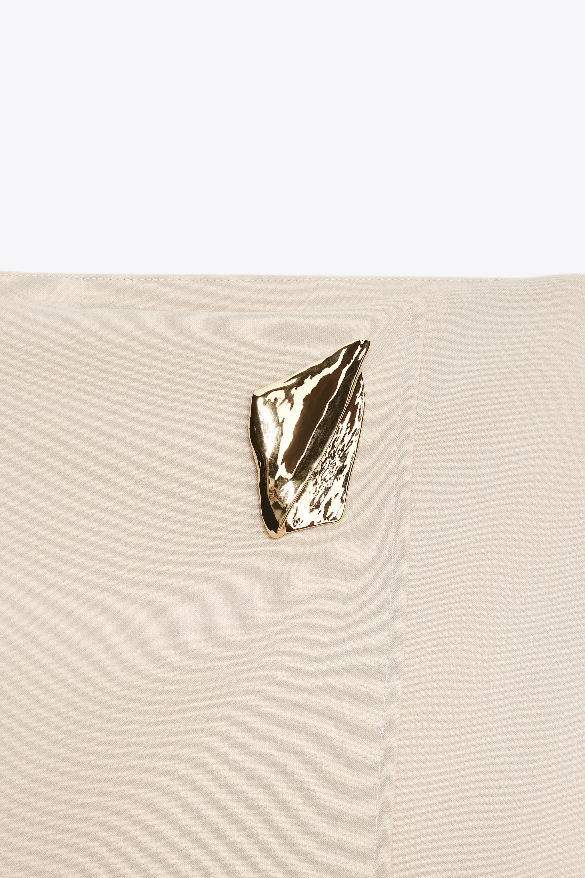 ASYMMETRICAL CULOTTE SKIRT WITH APPLIQUE