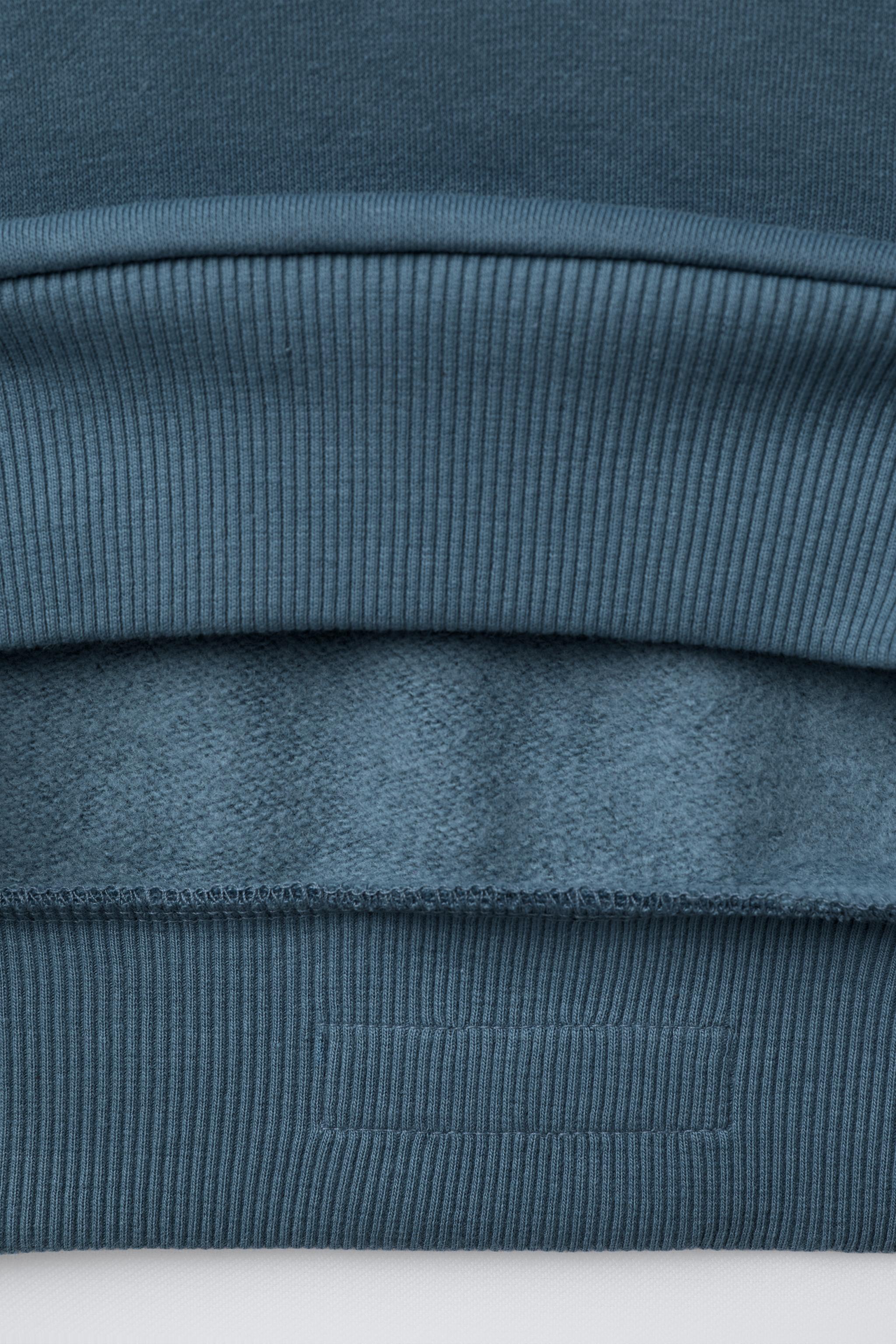 FLOCKED TEXT SWEATSHIRT