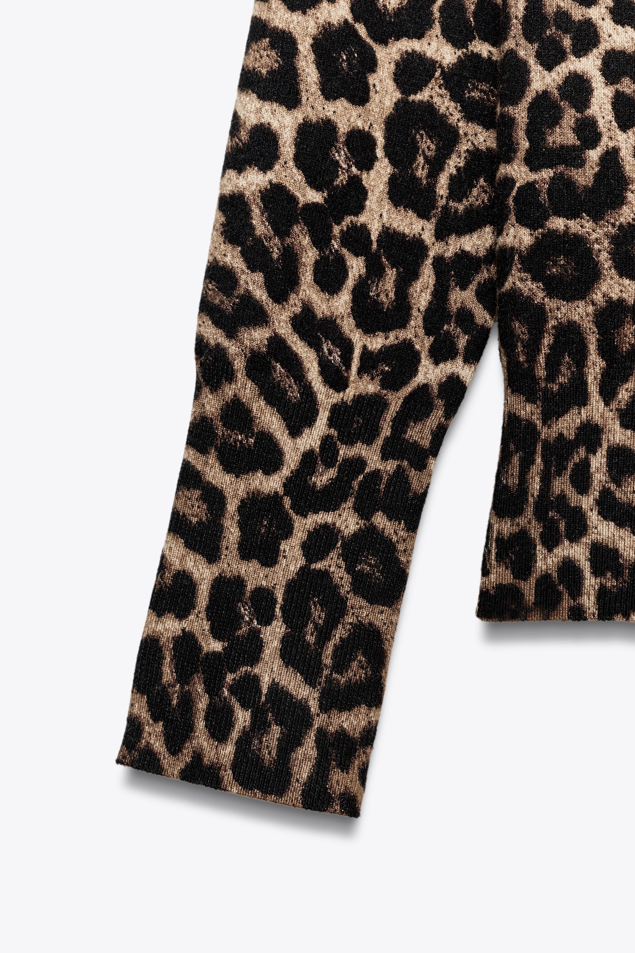 ANIMAL PRINT KNIT SWEATER