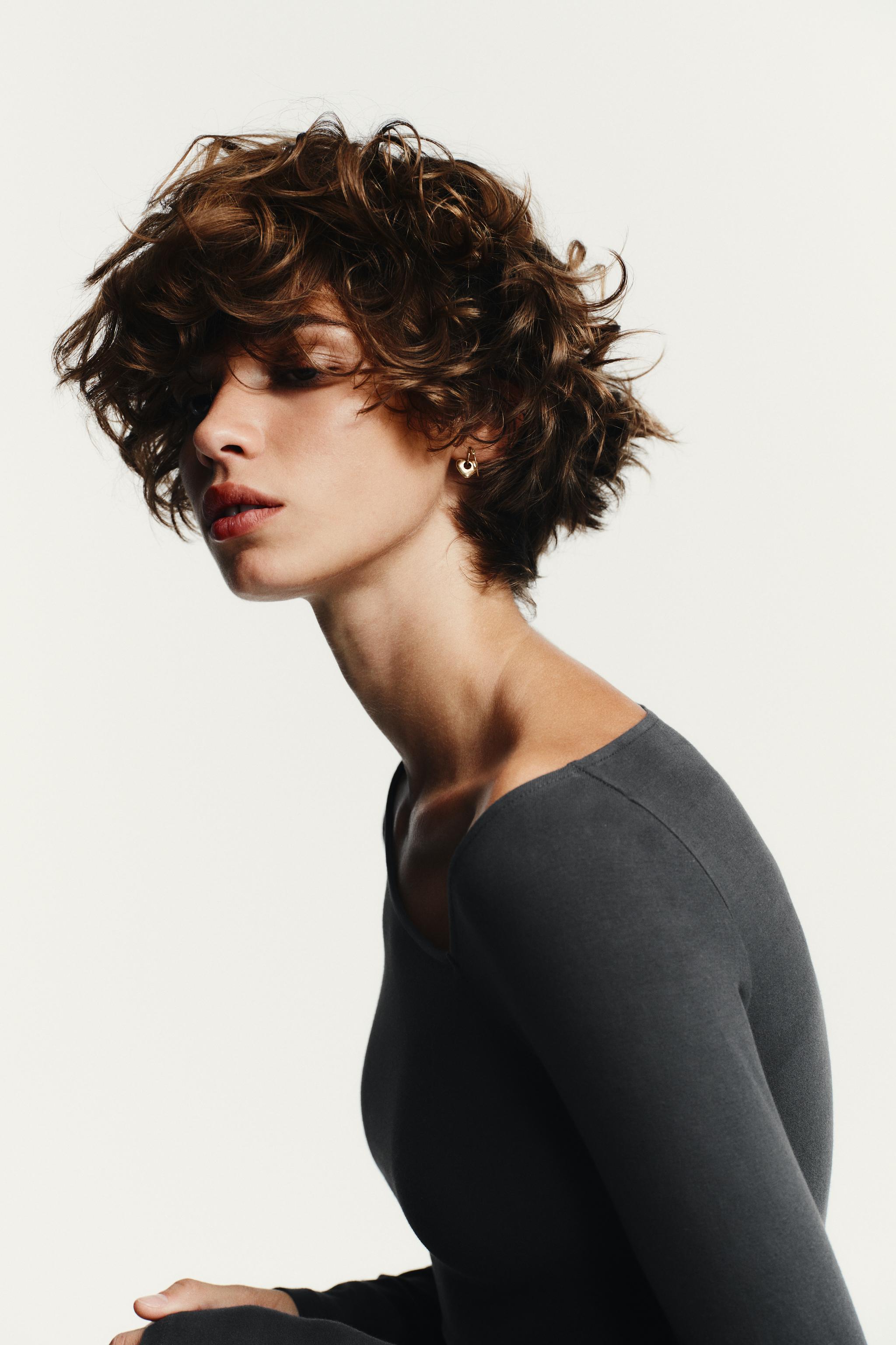 ASYMMETRIC LONG SLEEVE BODYSUIT