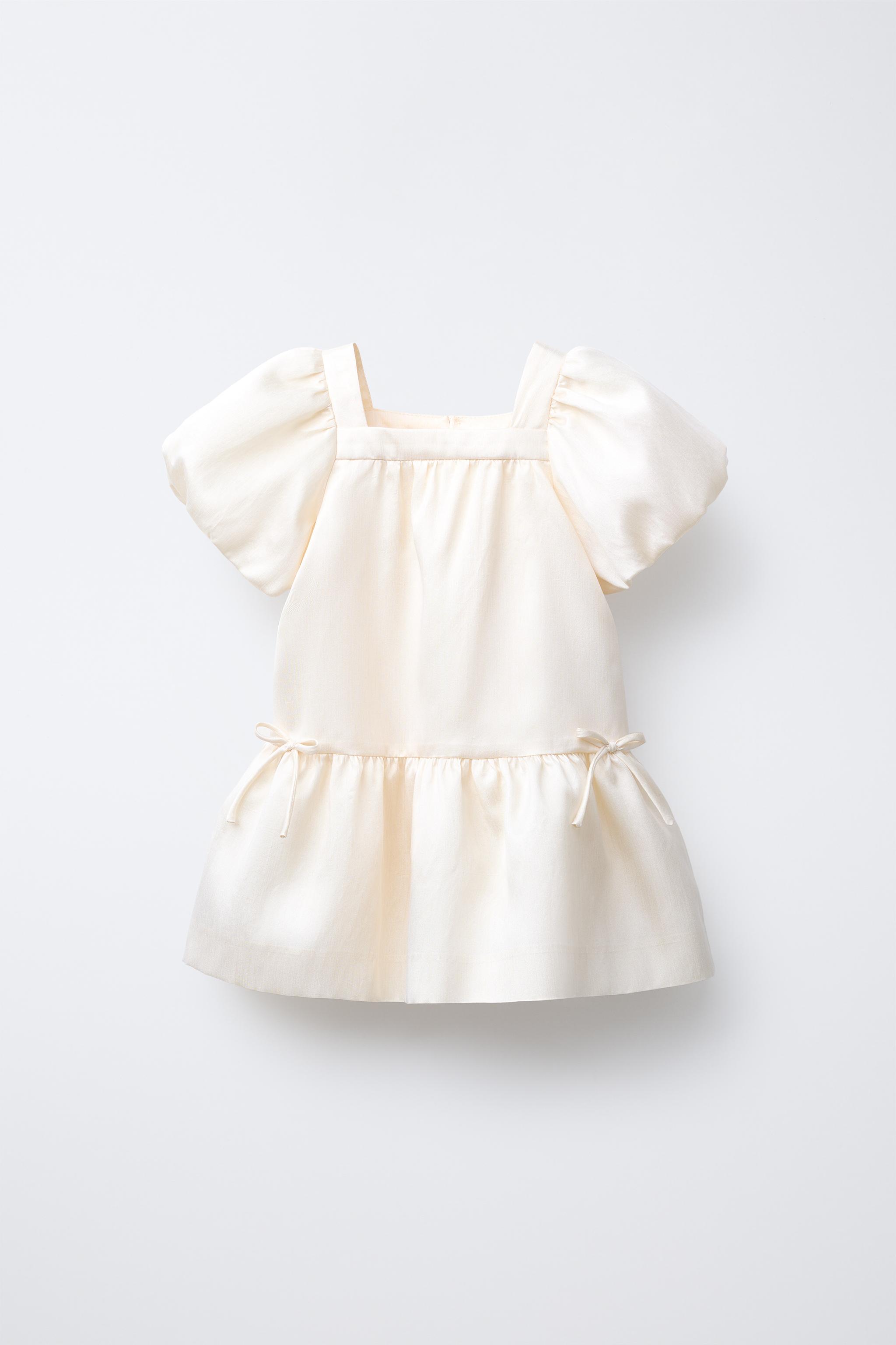 SATIN DRESS WITH BOWS