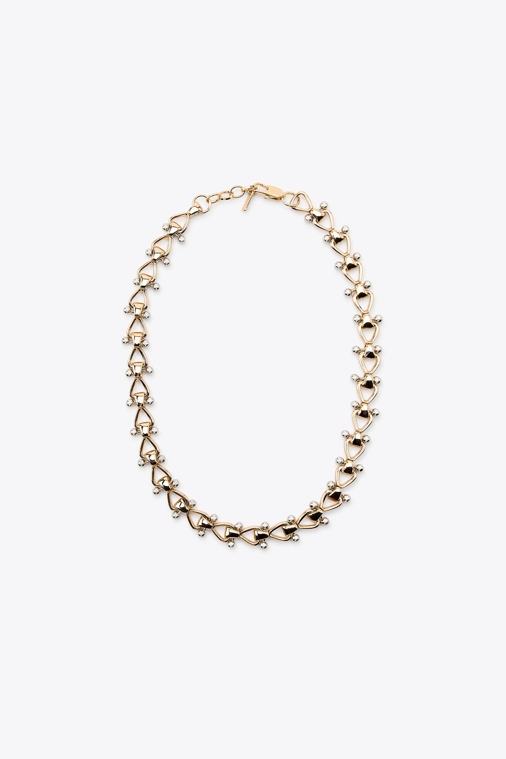 COMBINED METAL PIECE NECKLACE