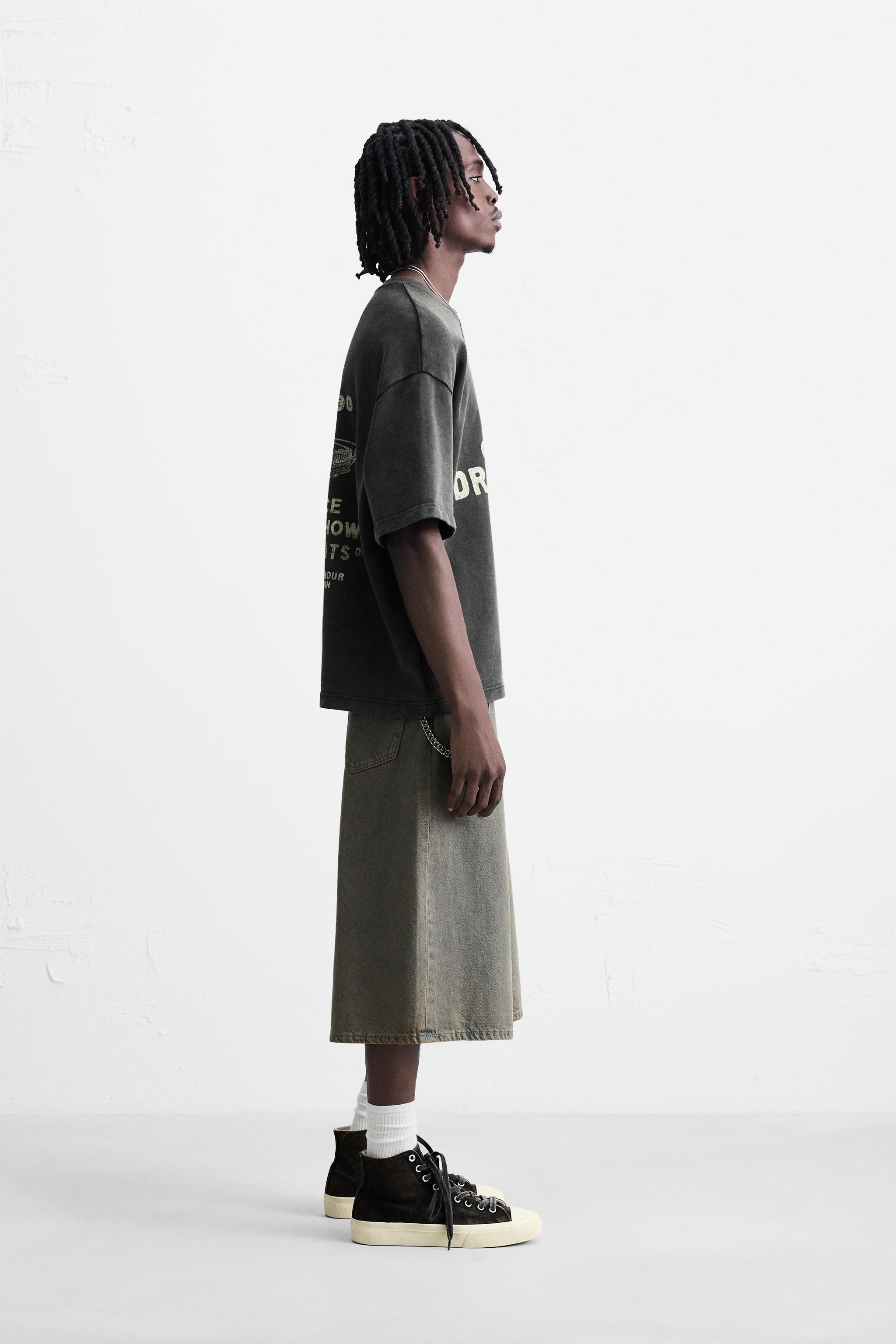 WASHED SWEATSHIRT WITH GRAPHIC PRINTS