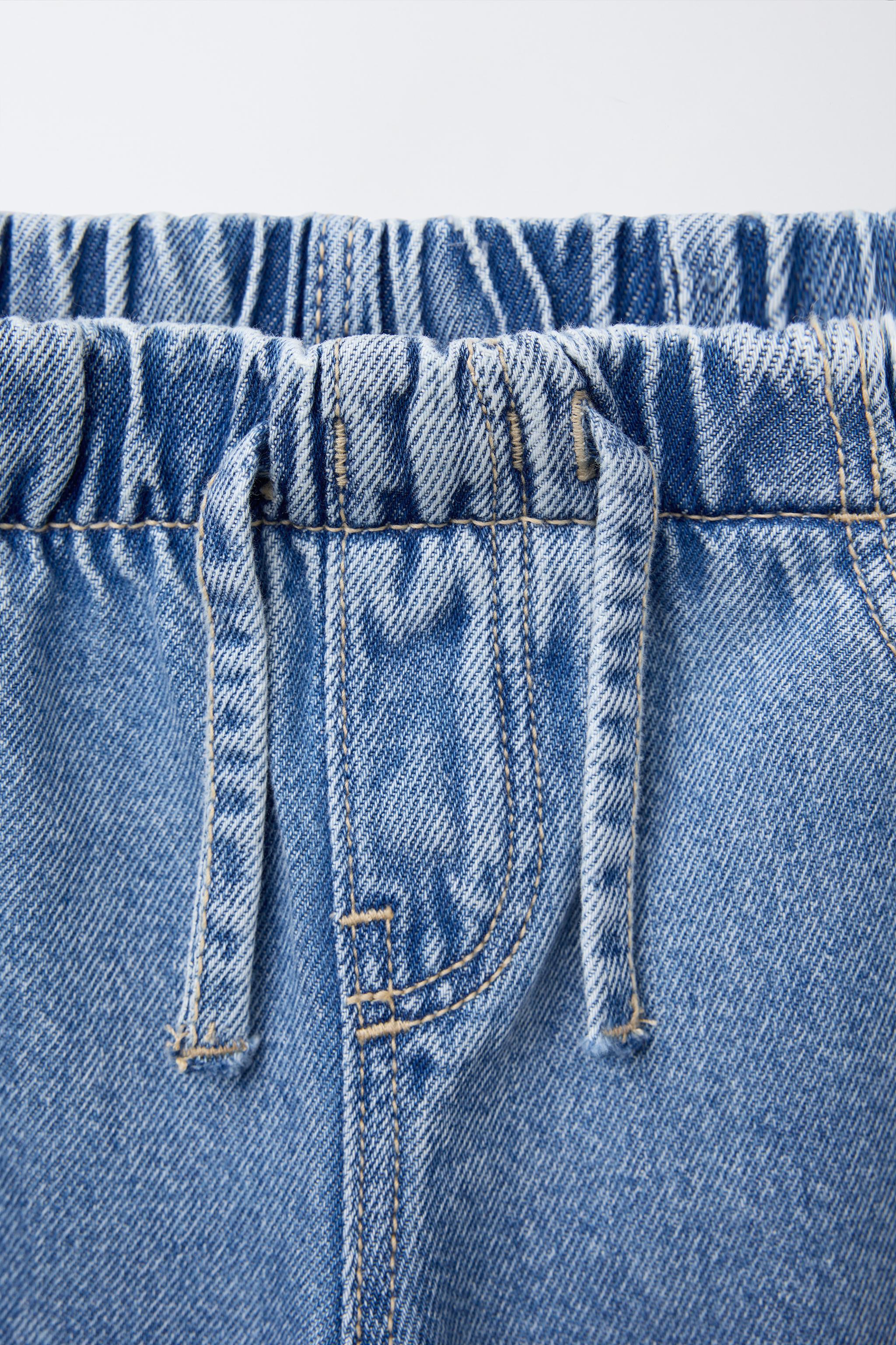 FLUID RIPPED WIDE LEG JEANS