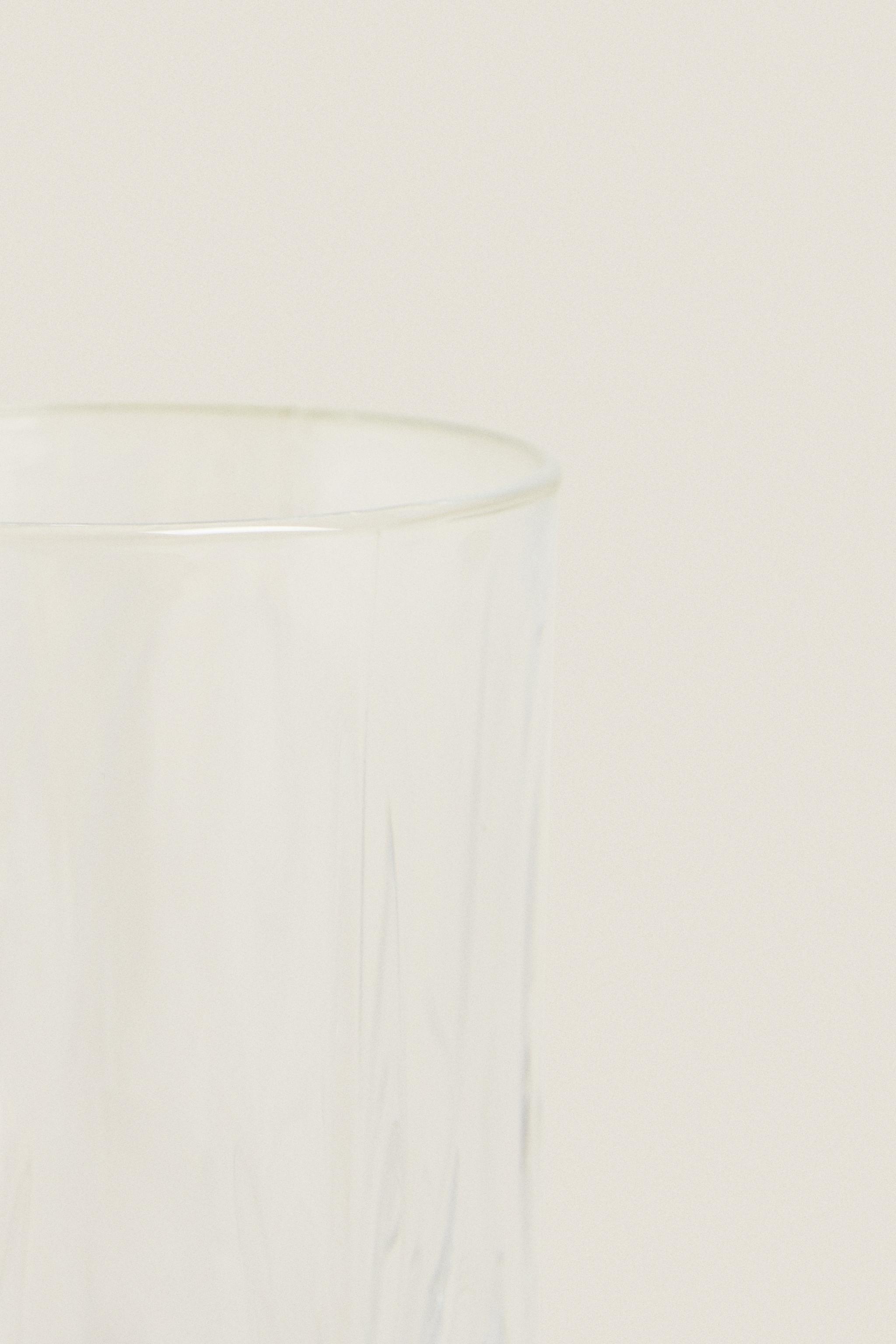 TALL TUMBLER WITH RAISED DESIGN