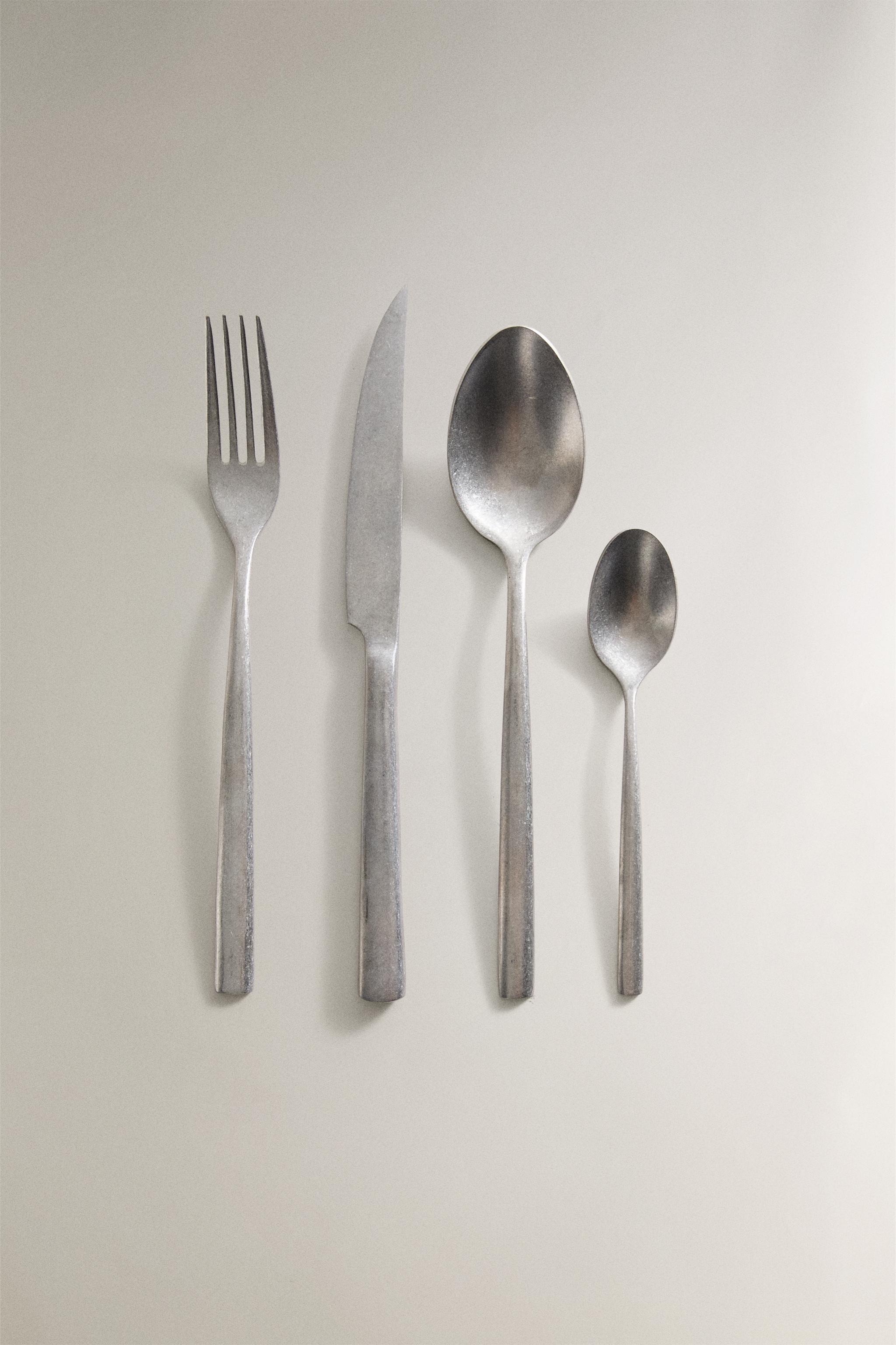 4-PIECE VINTAGE STEEL FLATWARE SET
