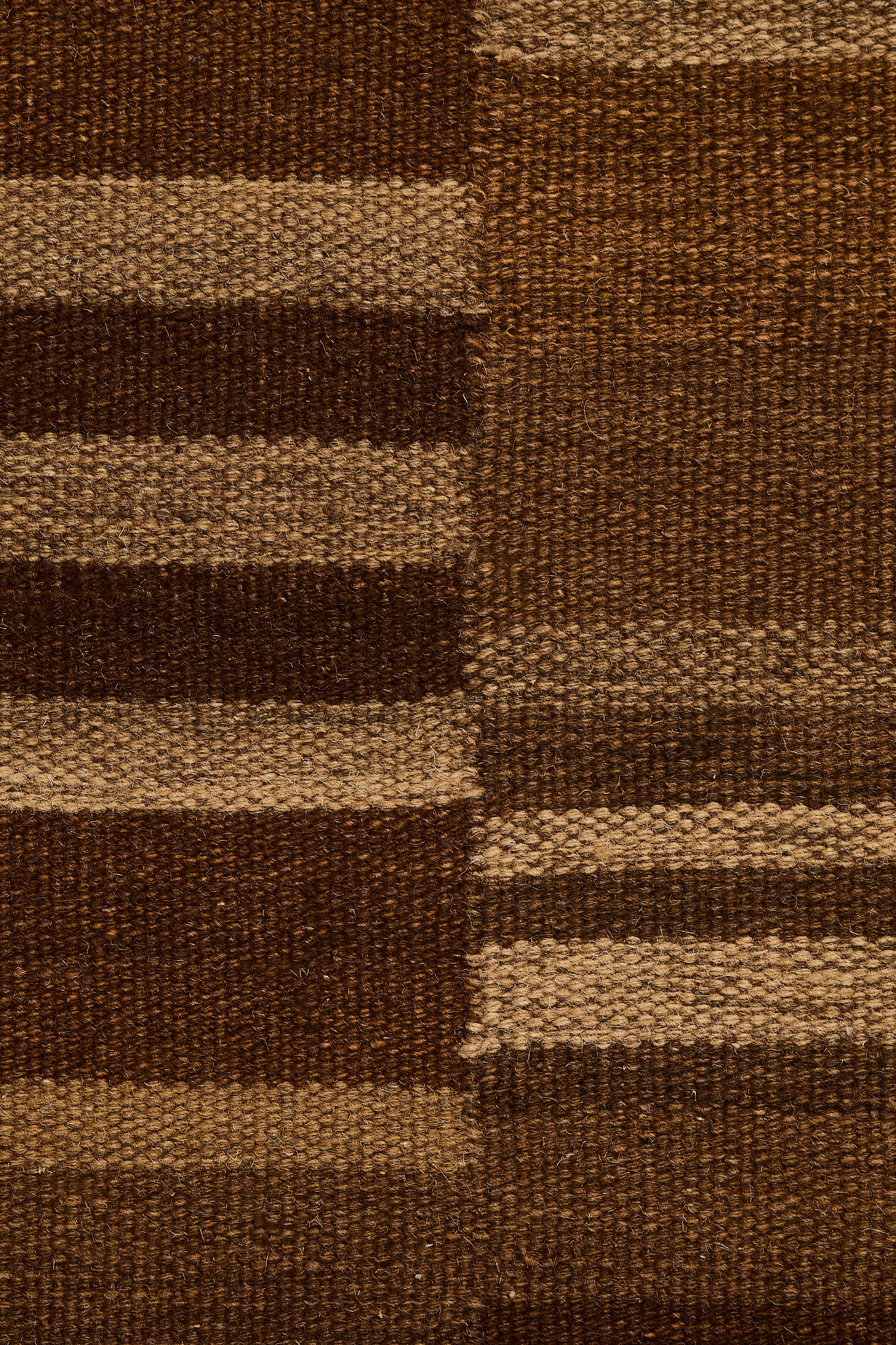STRIPED AREA RUG WITH FRINGING