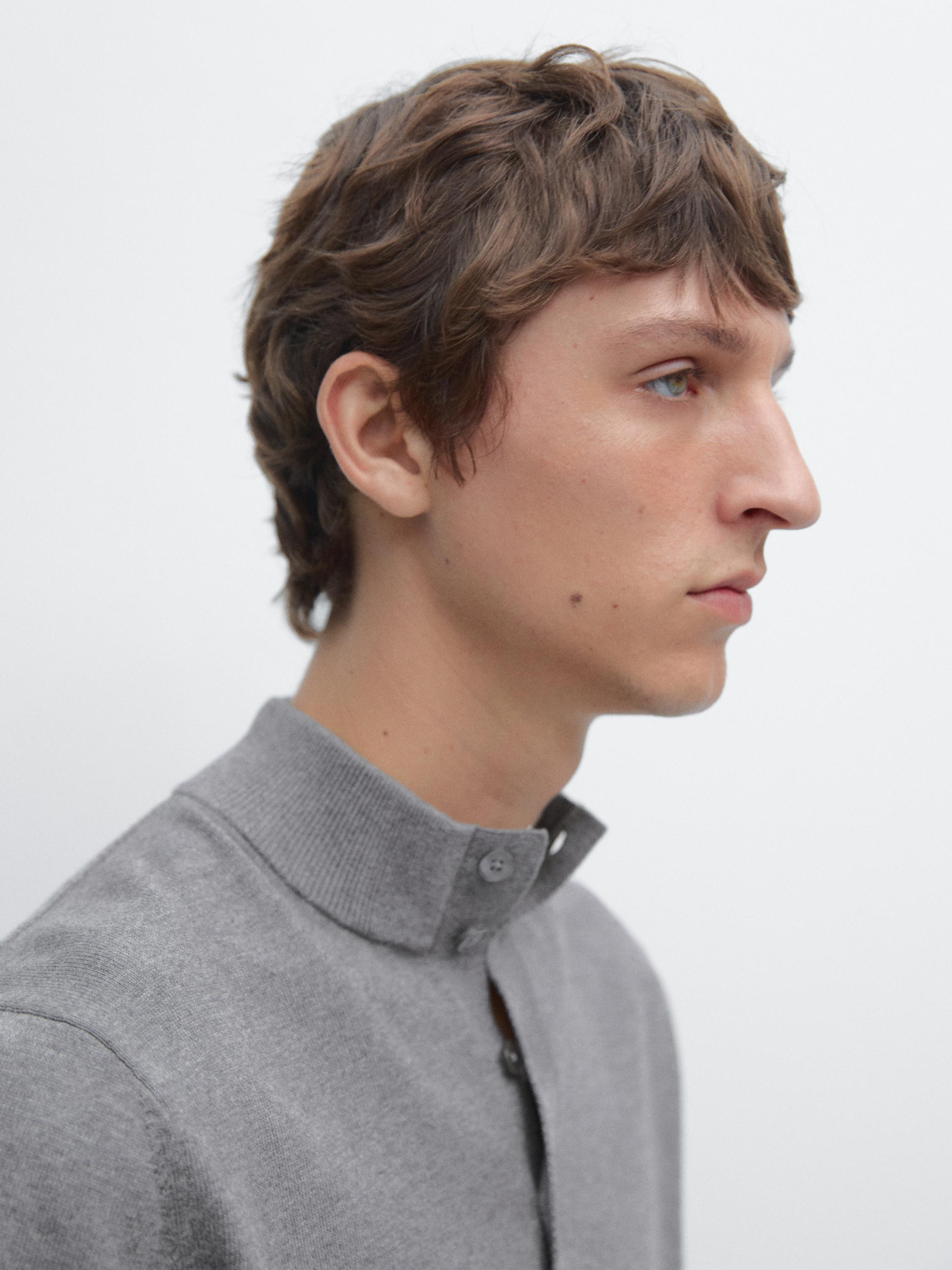 Knit sweater with mock button neck