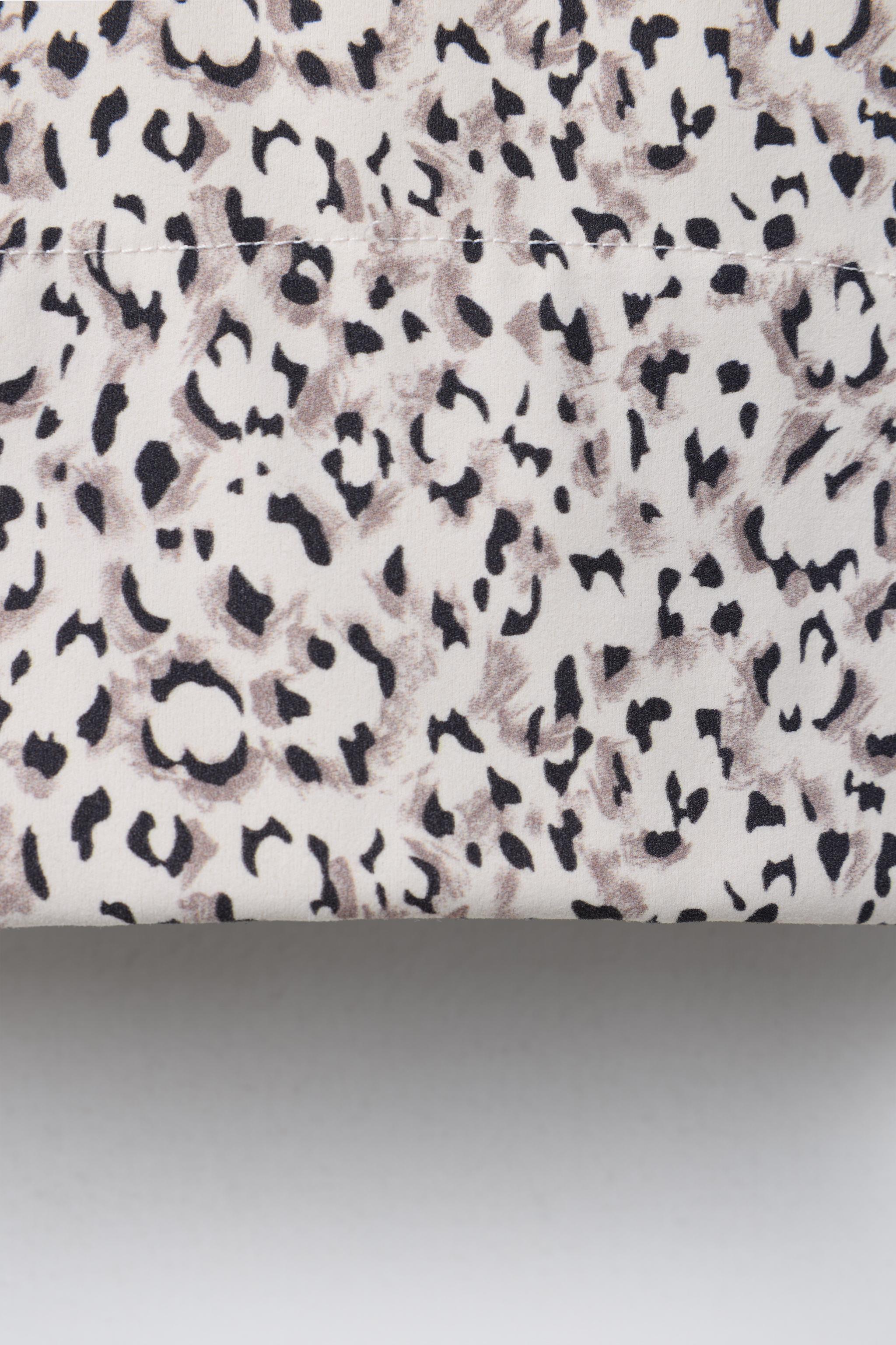 SPORTY ANIMAL PRINT TOP