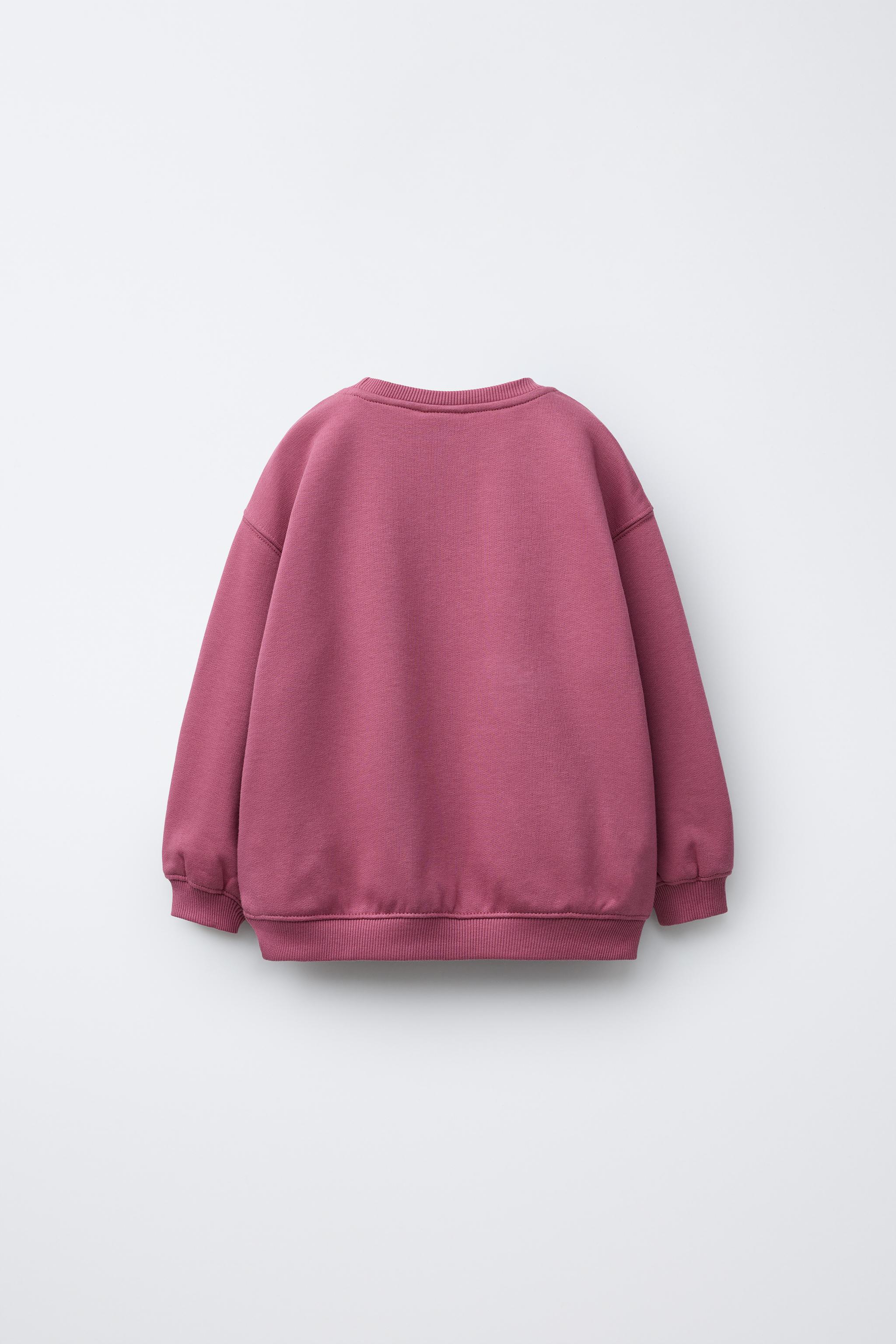 RAISED PRINT SWEATSHIRT