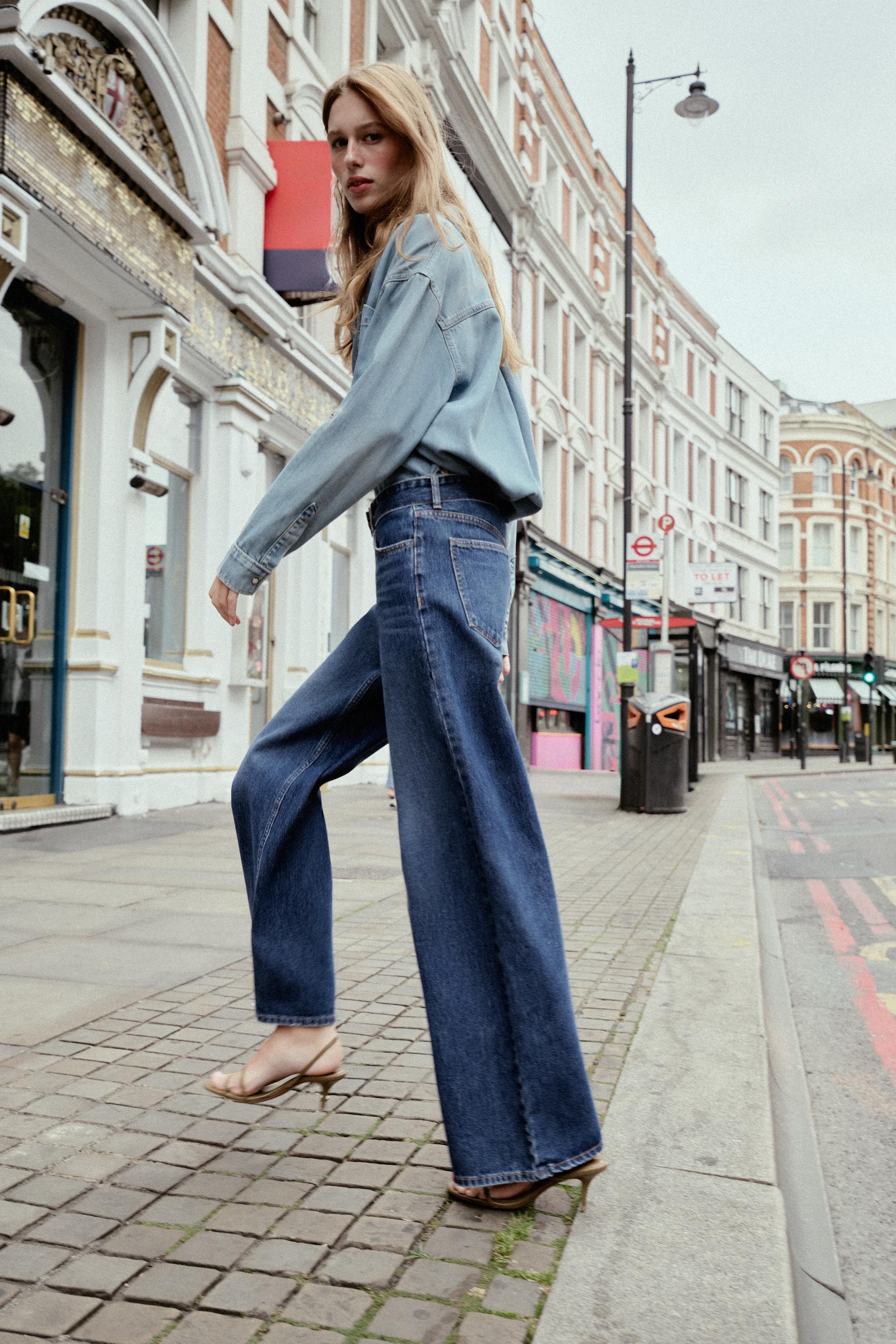MID-RISE BELTED WIDE LEG JEANS