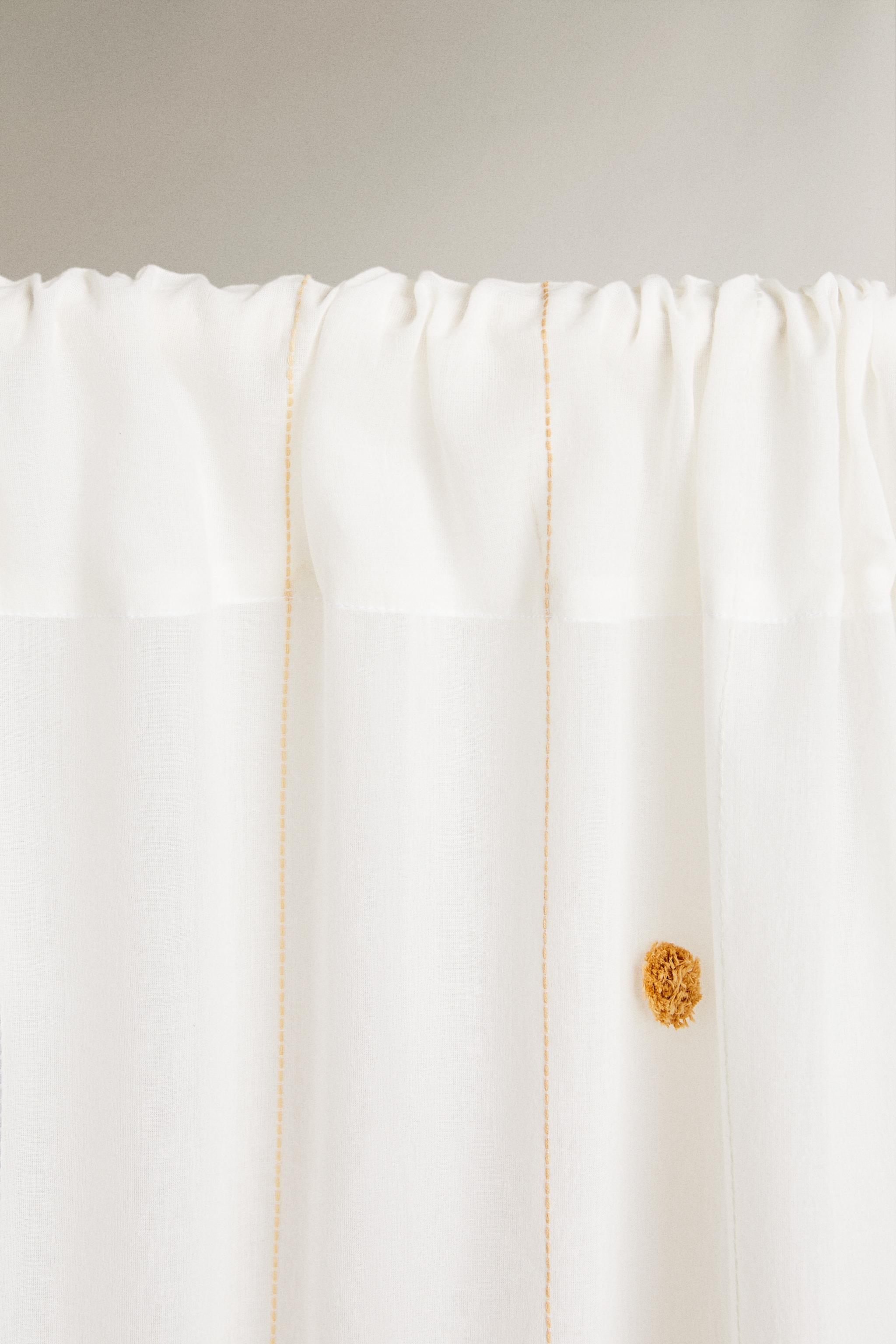 LOW OPACITY TASSEL CURTAIN