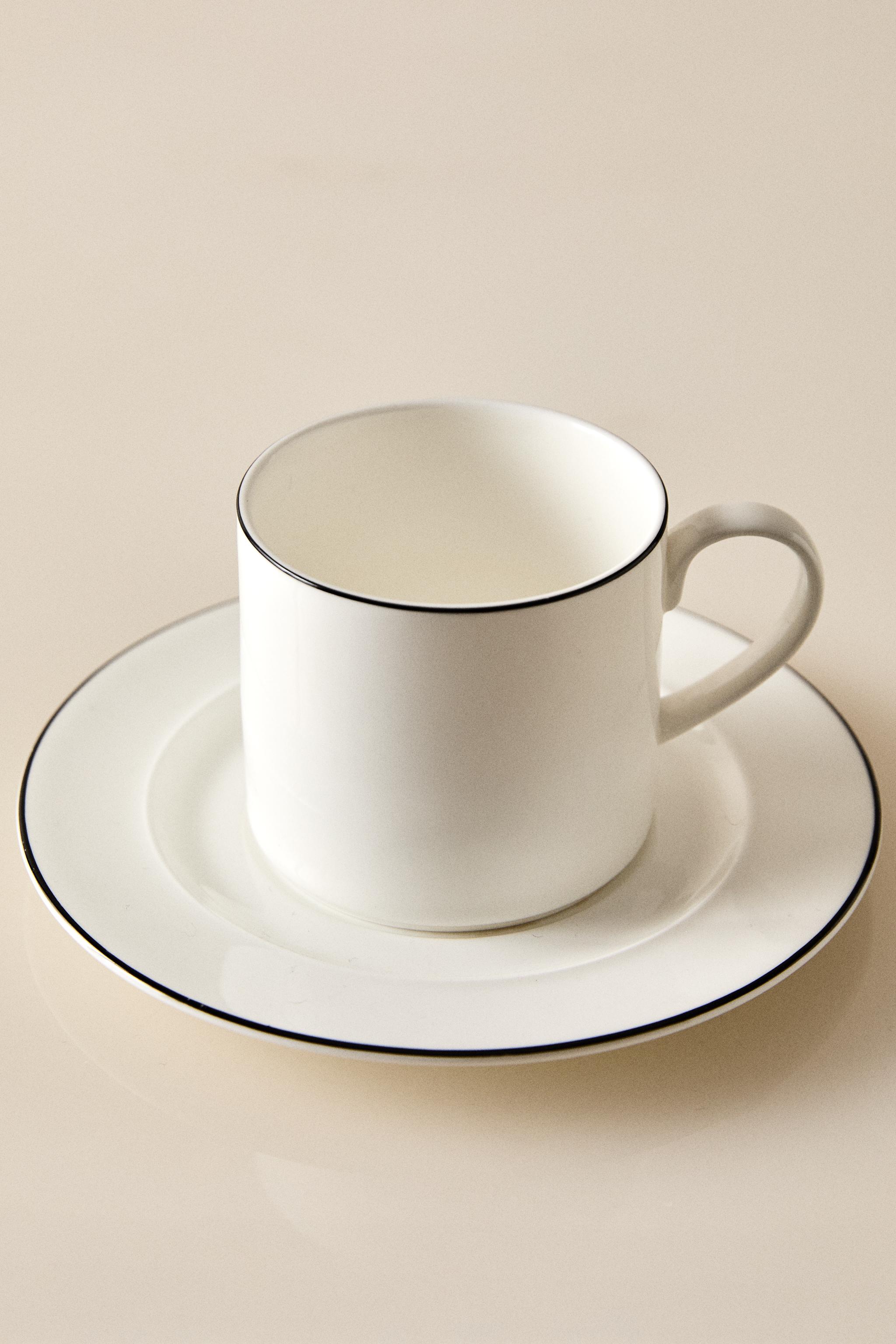 BONE CHINA TEACUP AND SAUCER WITH BLACK RIM
