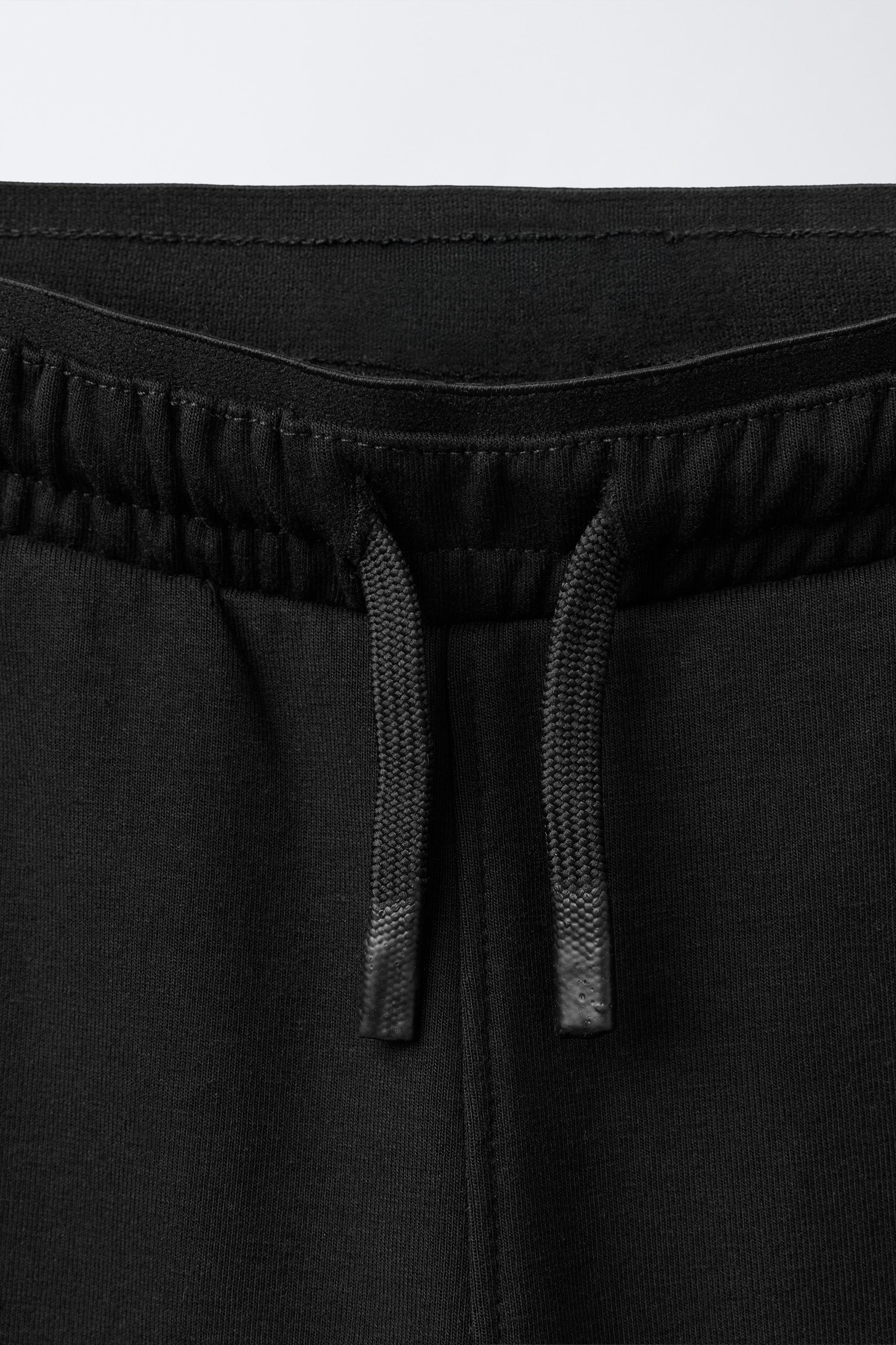 SPORTY INTERLOCK PANTS