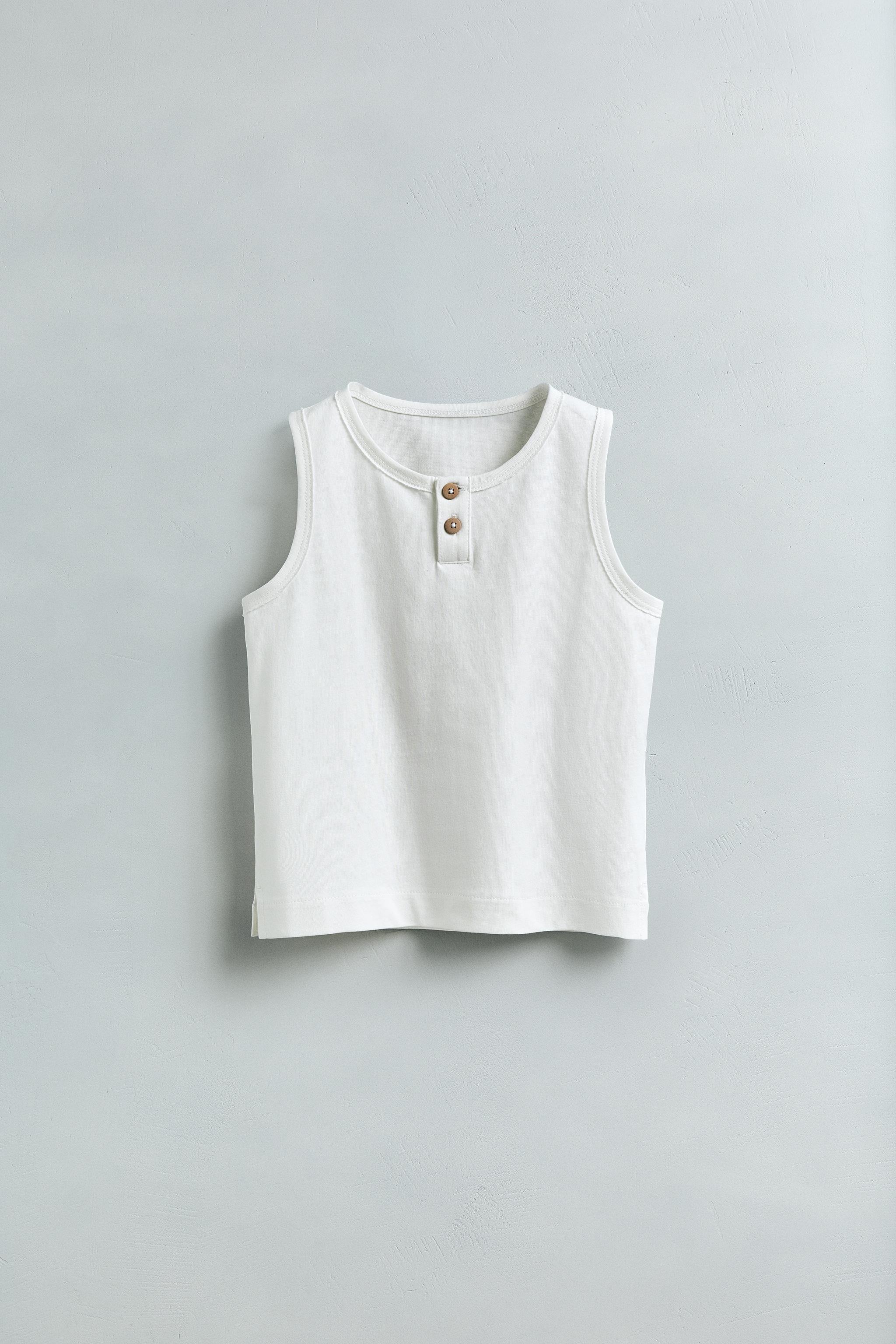 SLEEVELESS TOP WITH BUTTONS