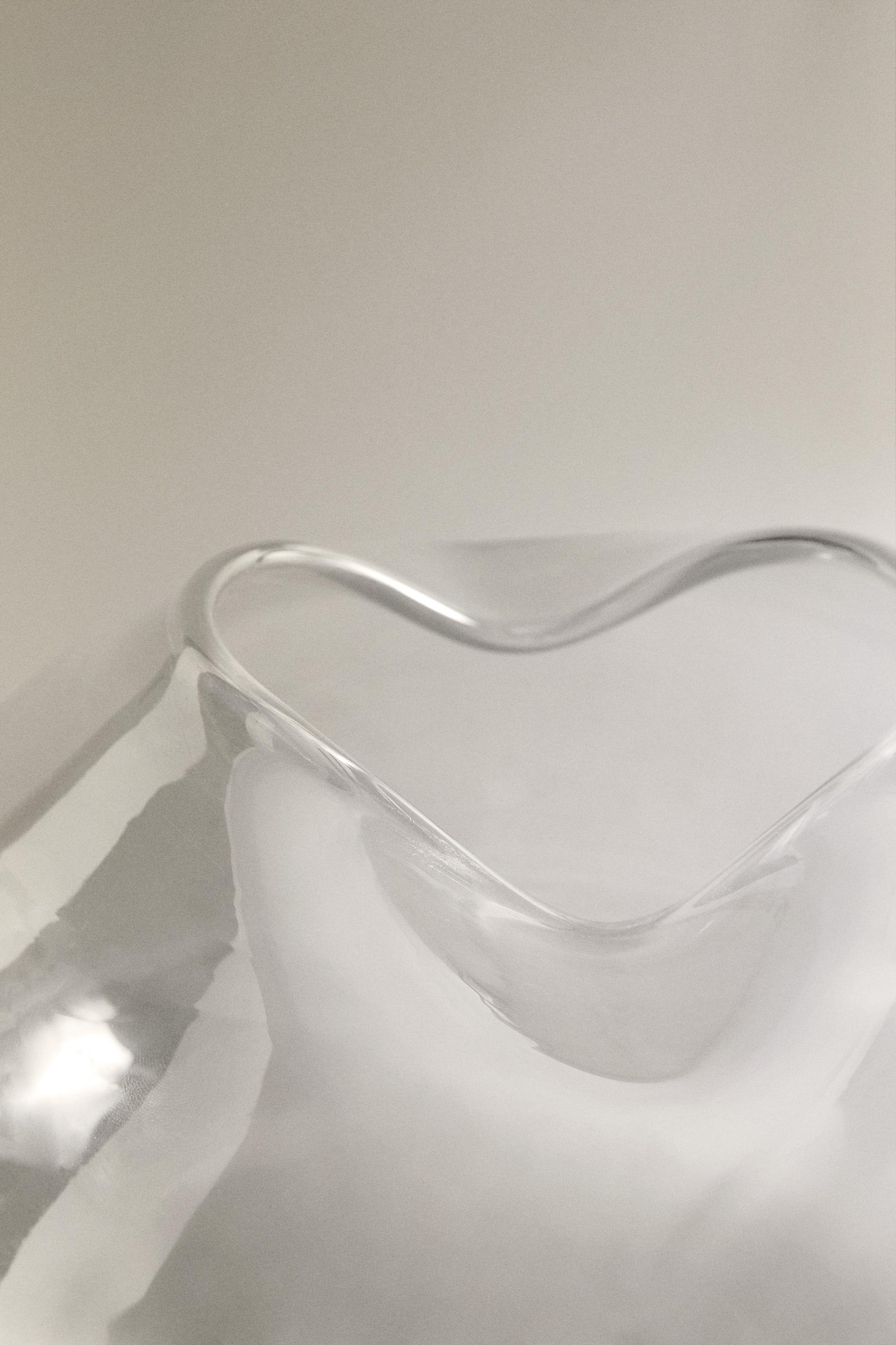 VASE WITH AN IRREGULAR LOW NECK