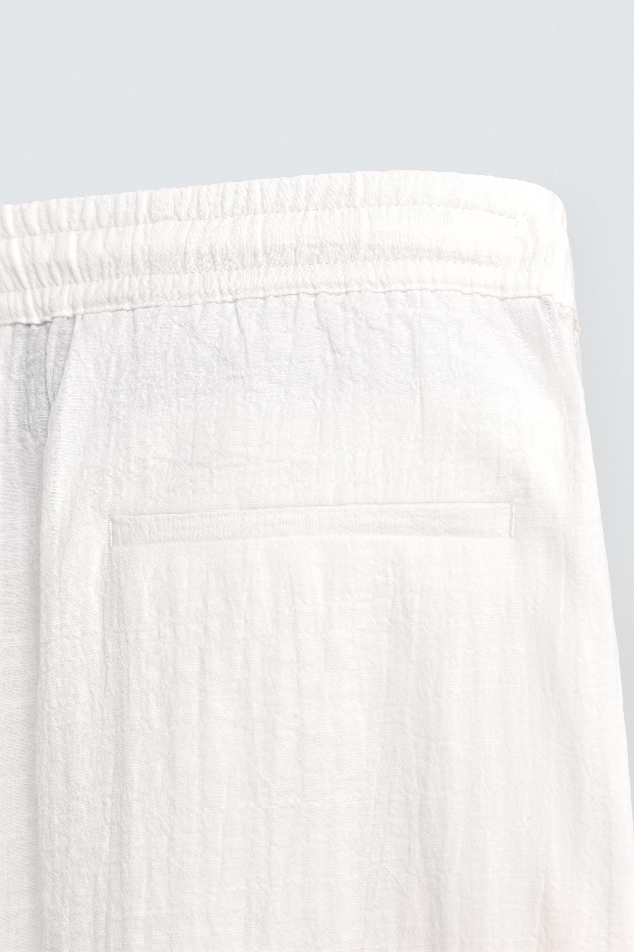 TEXTURED RELAXED FIT PANTS