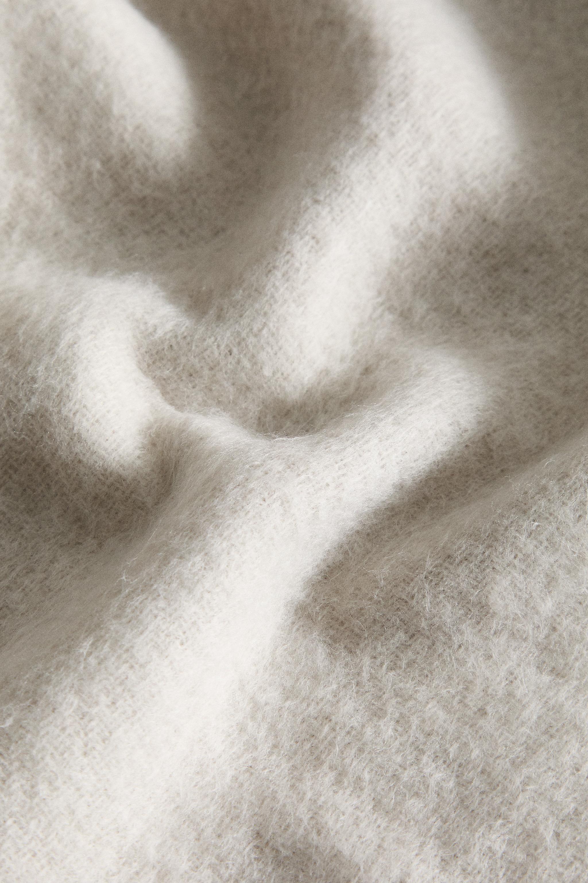 FRINGED SOFT BLANKET