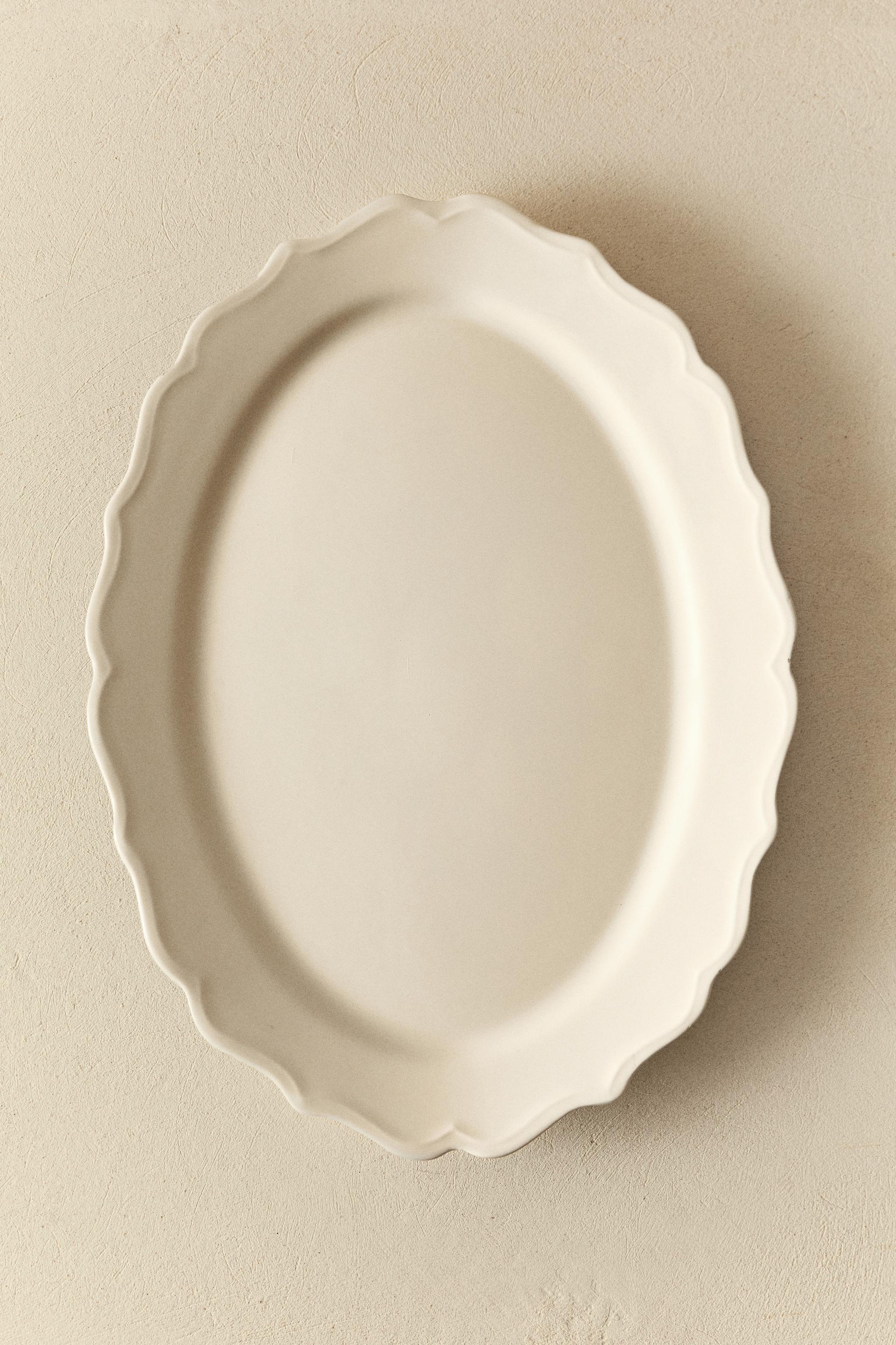 EARTHENWARE SERVING DISH WITH RAISED-DESIGN EDGE